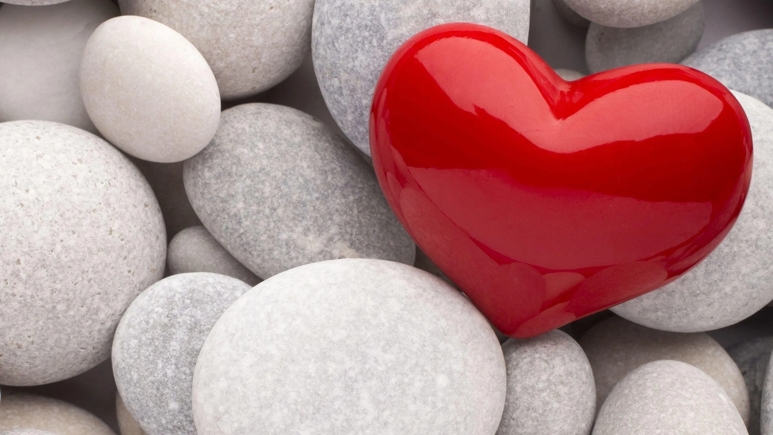 Heart Shaped Stone on Pebbles Showing Calm Affection
