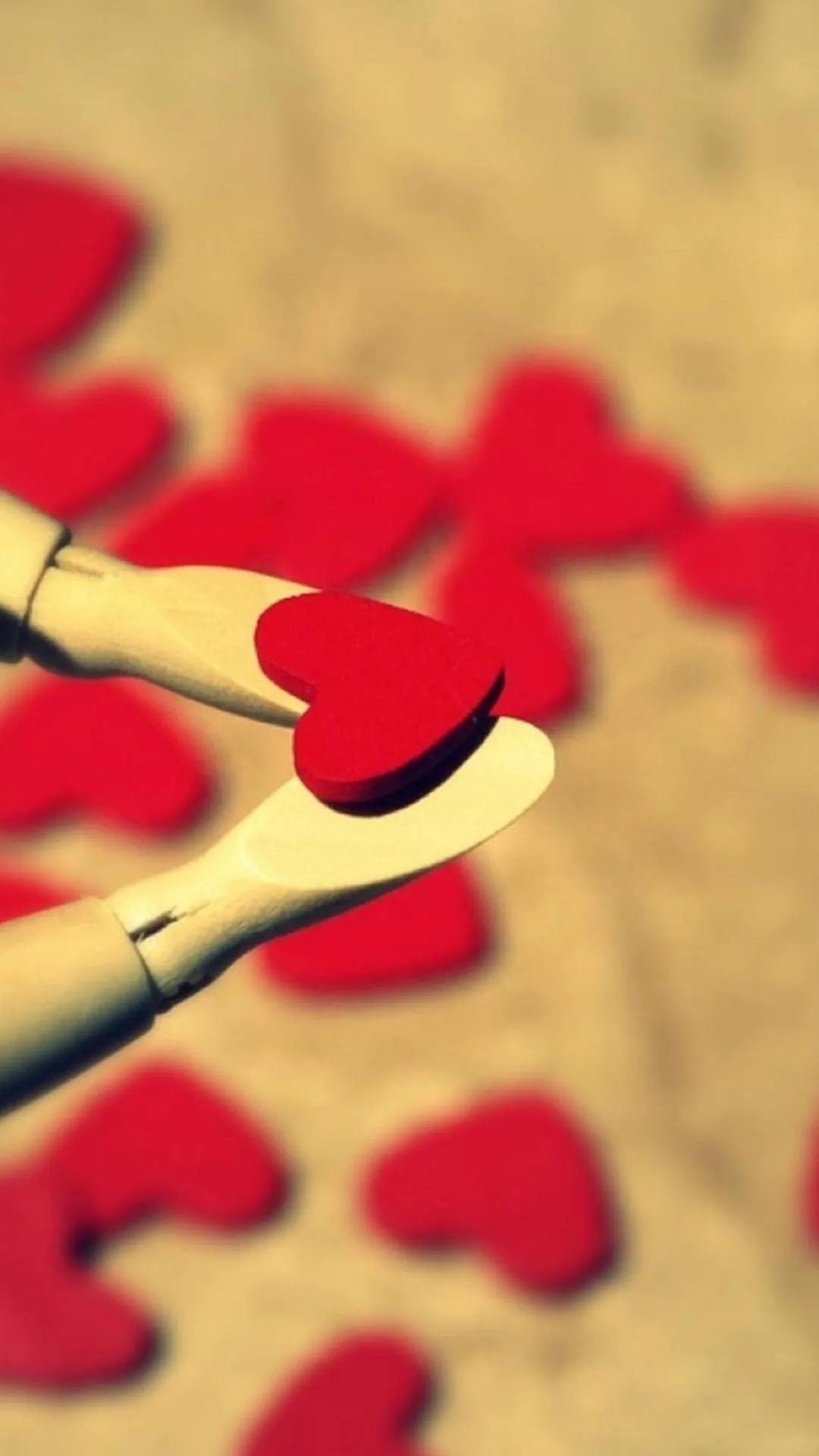 Holding a Red Heart Symbol of Love and Affection Image