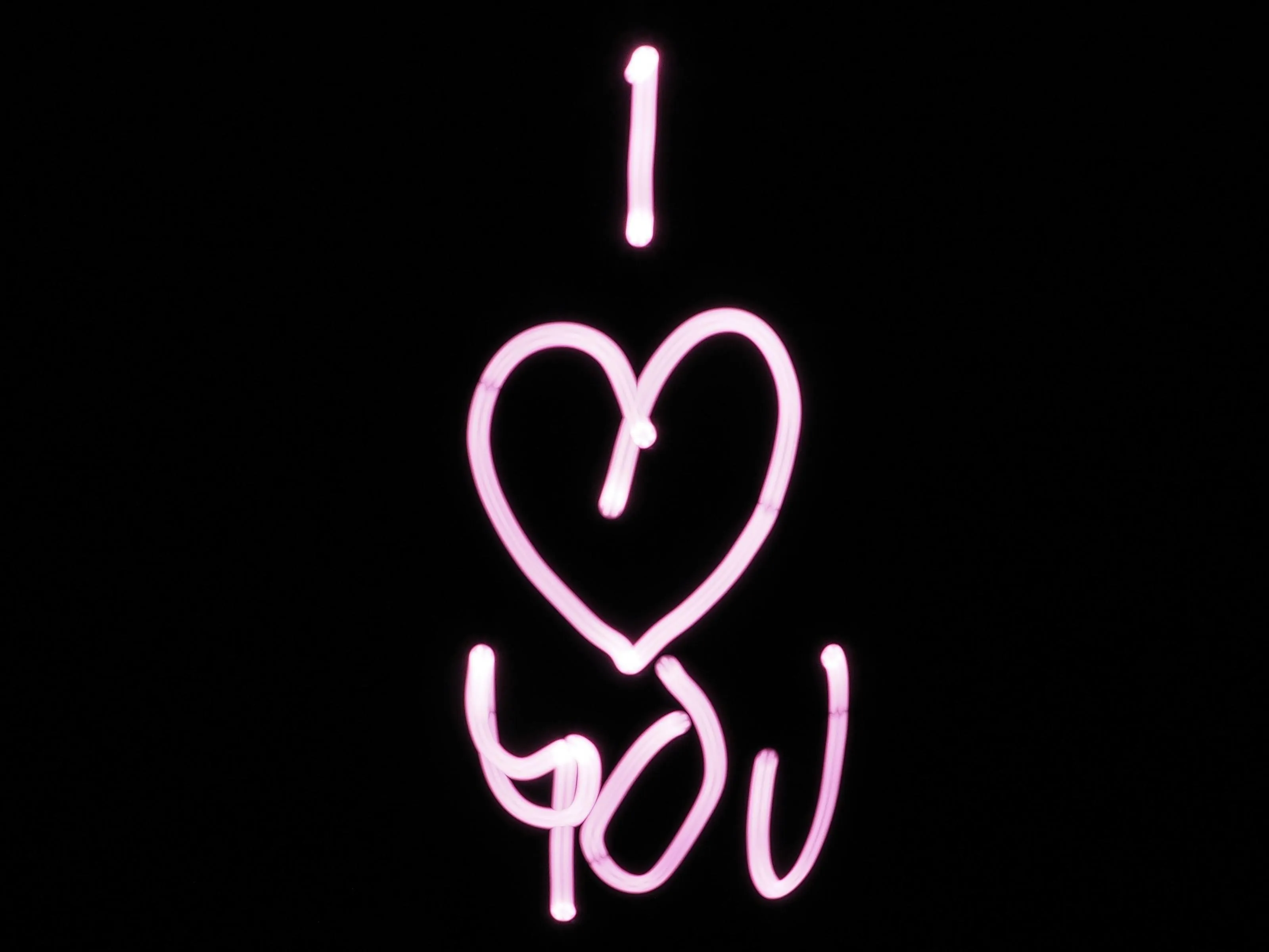I Love You Text Glowing in Romantic Neon Light Wallpaper