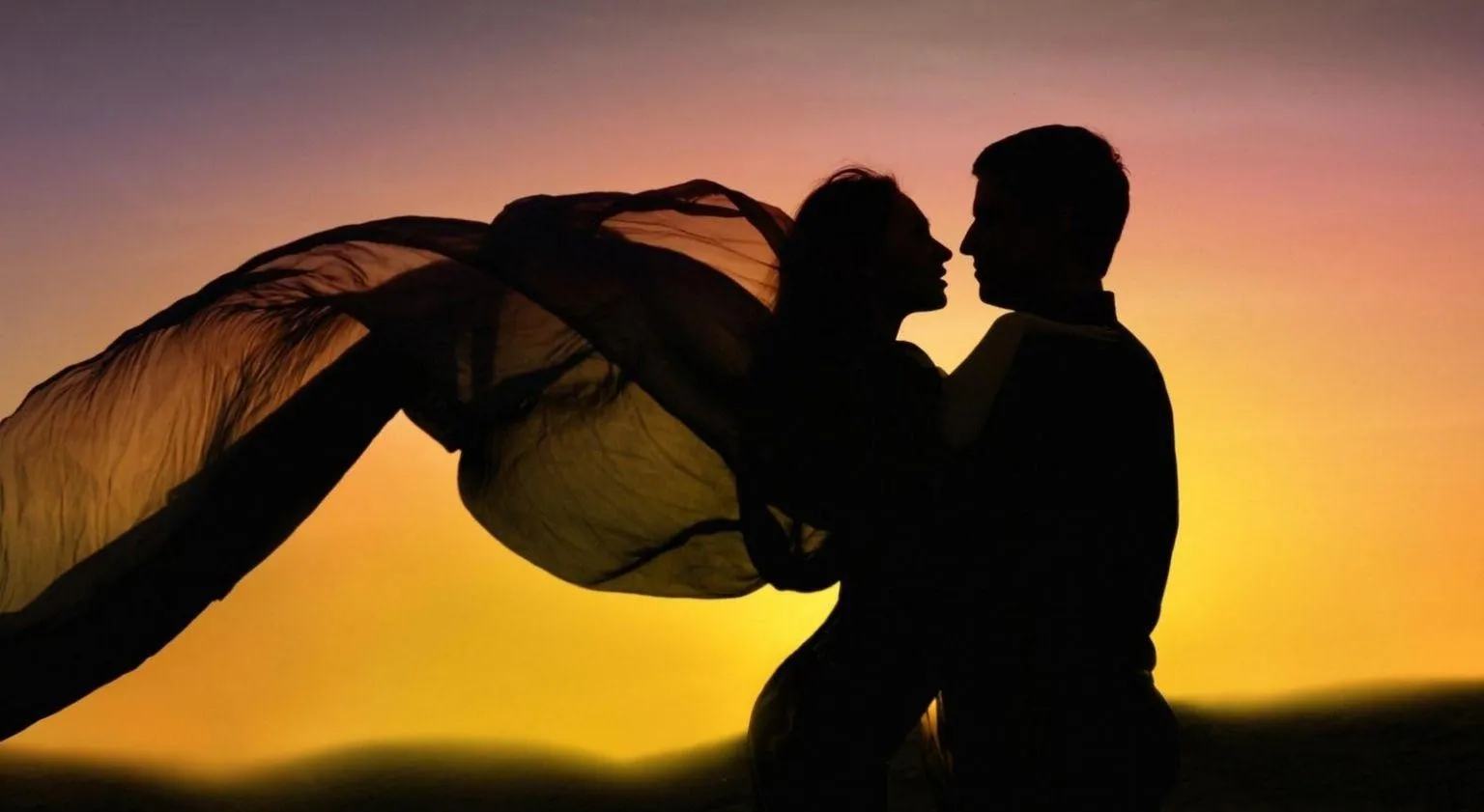 Landscape of Romantic Couple Silhouette in Warm Sunset Glow