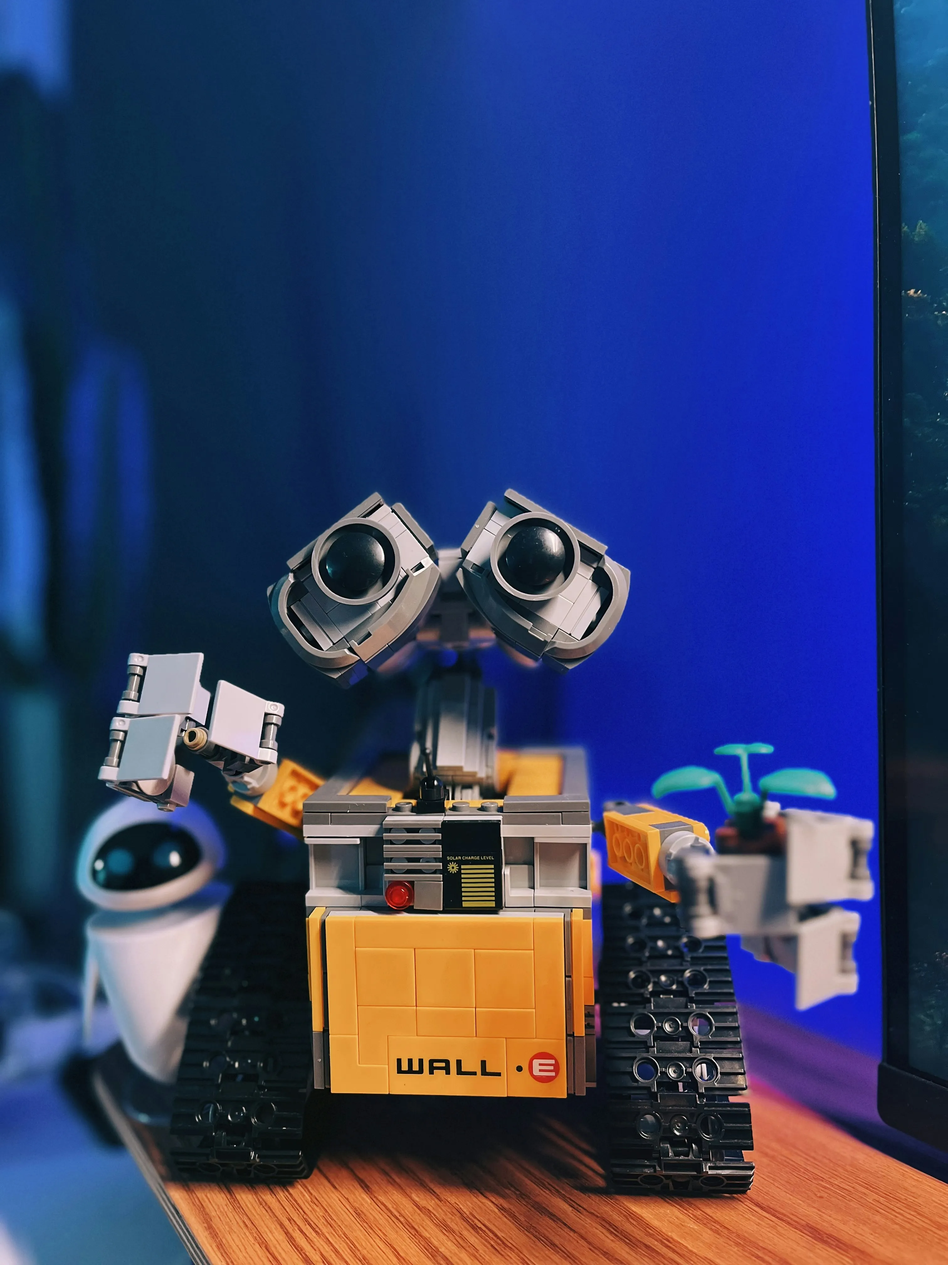 Lego Wall E Robot Display with Eve and Green Plant Model