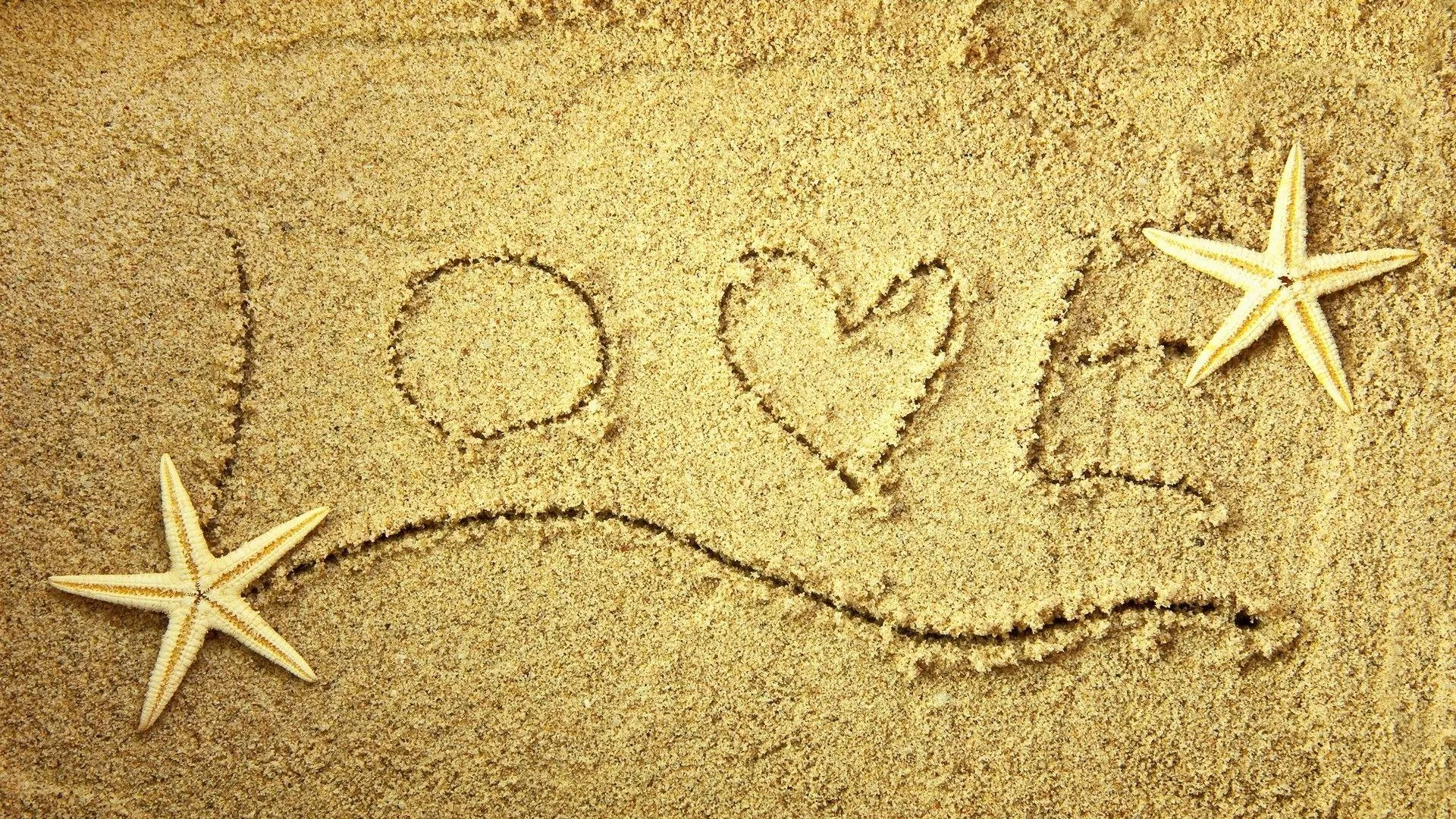 Love Written in the Sand with Starfish Accents Wallpaper