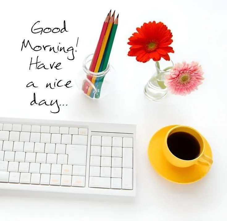 Lovely Sweet Flower and Coffee Cup on White Keyboard