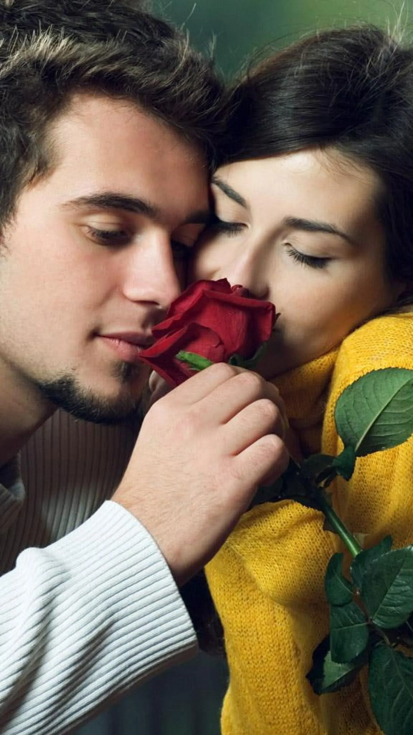 Loving Couple Sharing Warm Embrace of Trust Wallpaper