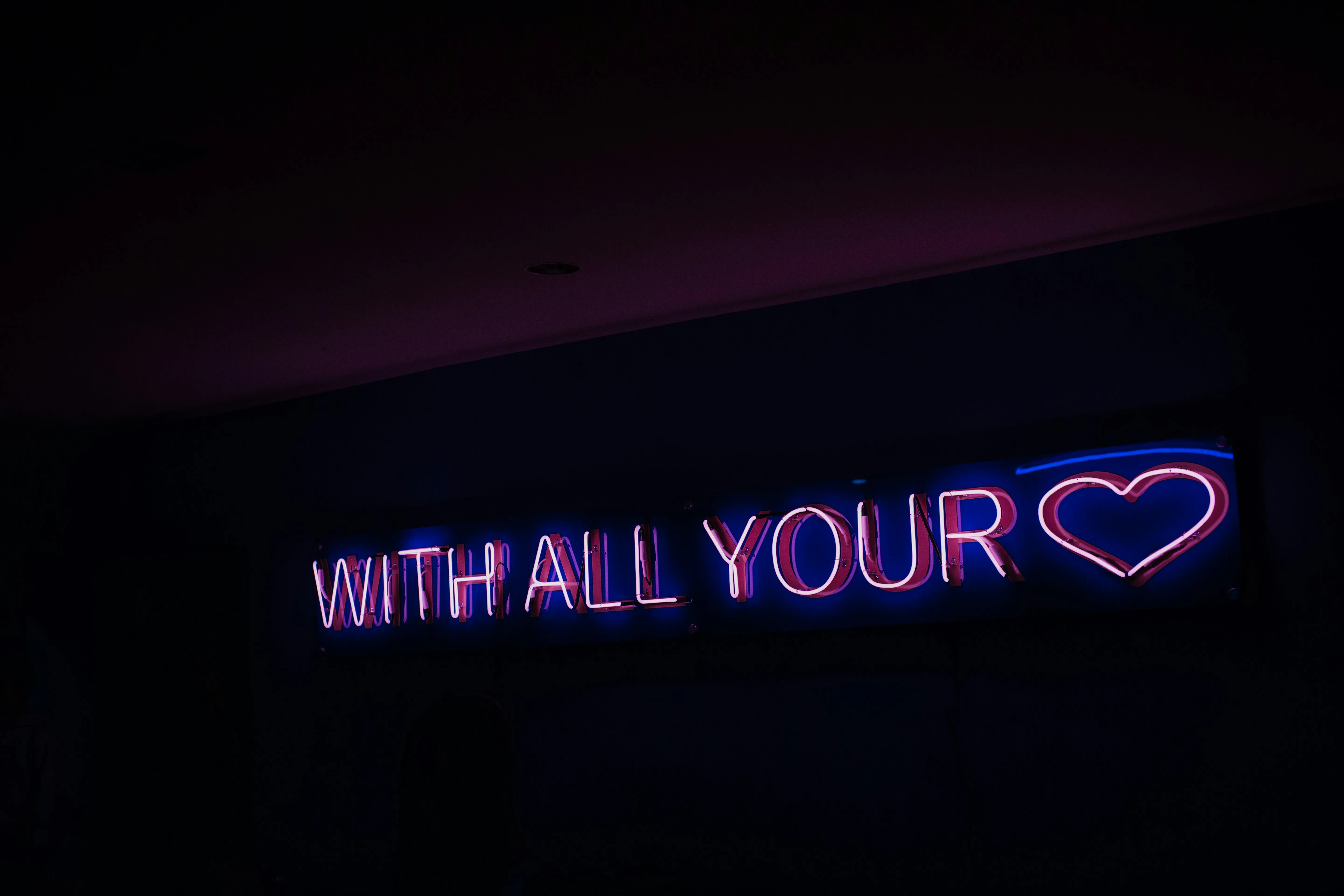 Neon Sign Reading with All Your Heart Glowing Wallpaper