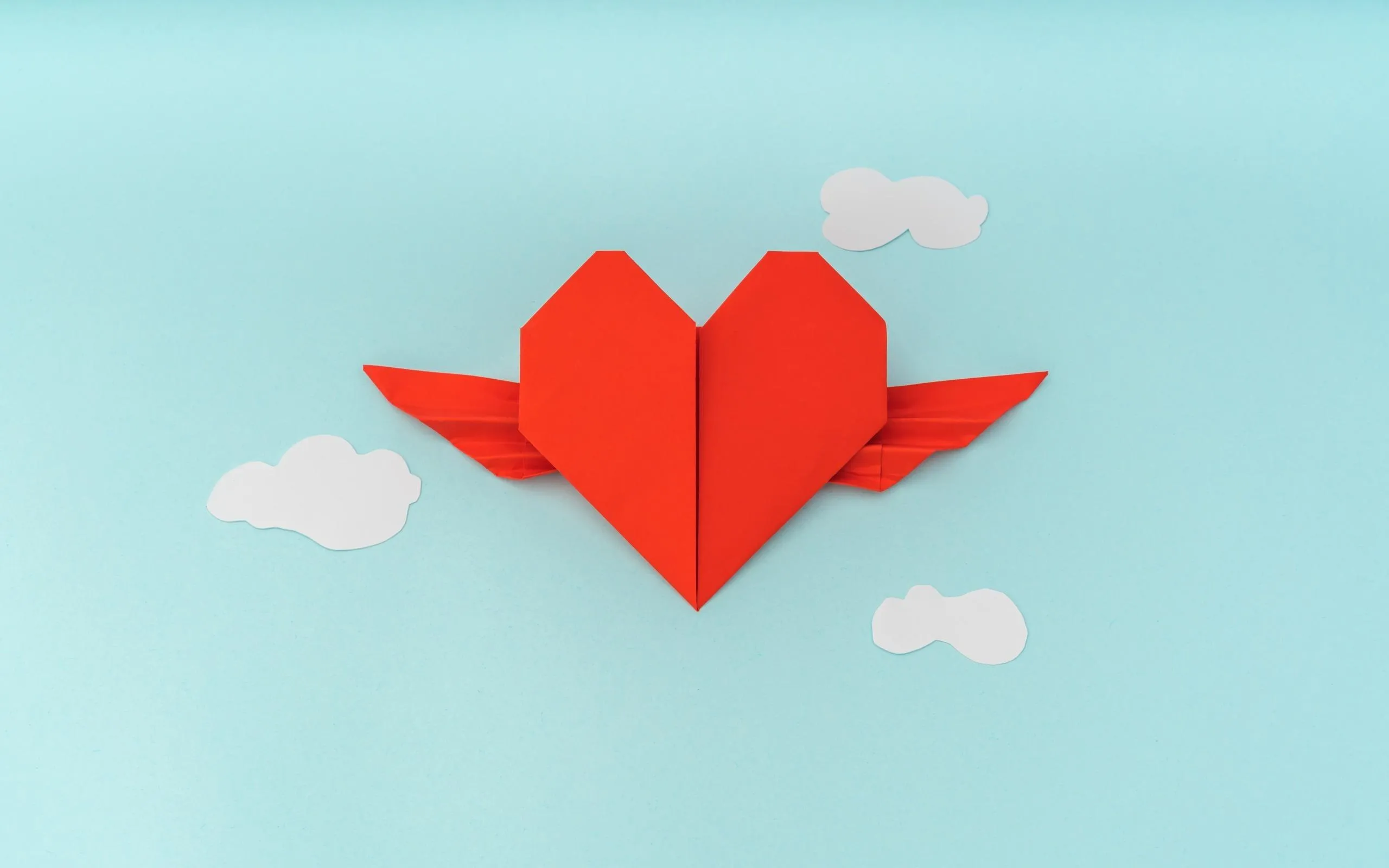 Paper Heart Floating on Blue Sky of Sweet Love Wallpaper