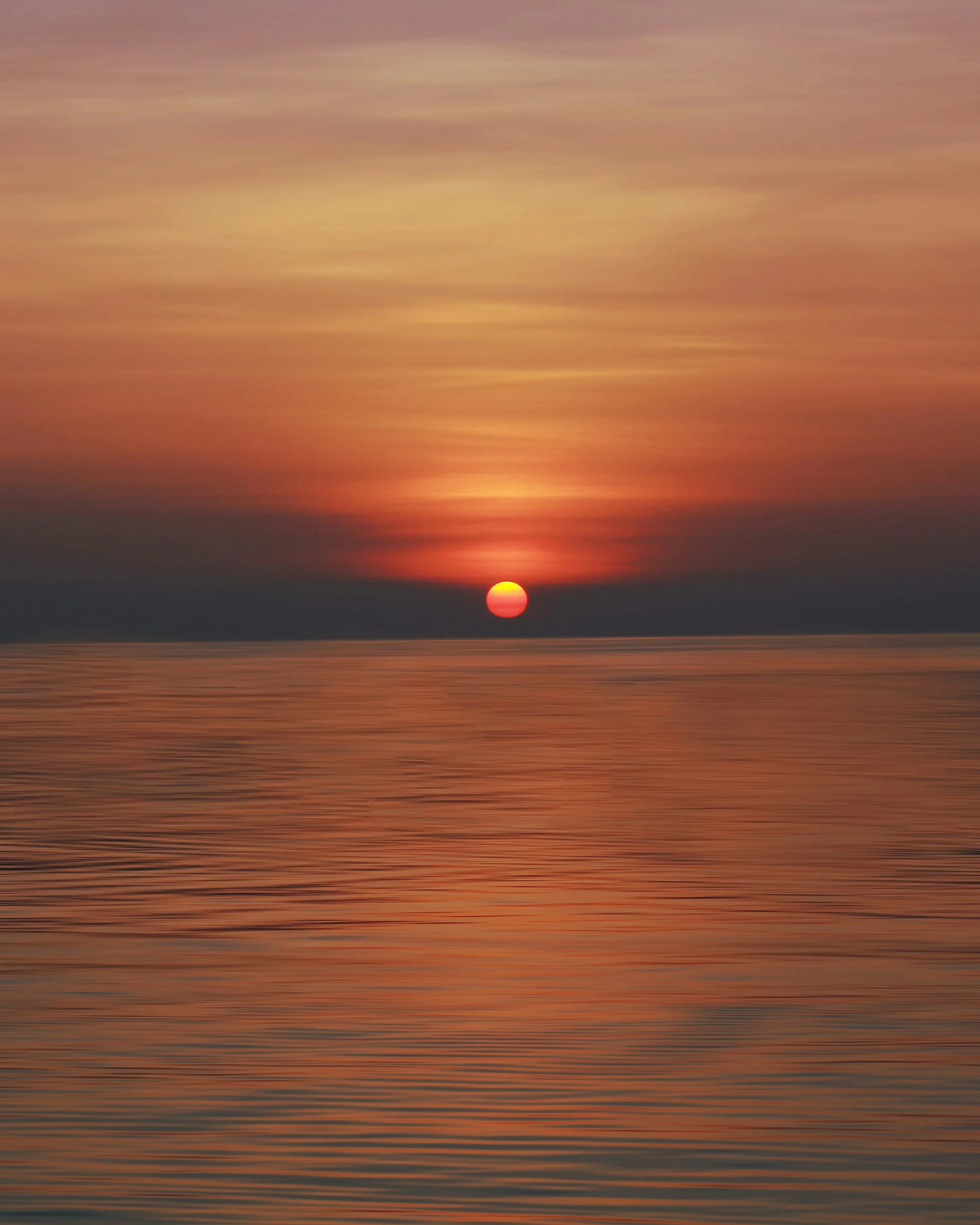 Peaceful Sunset Over Ocean Symbolizing Warm Love Wallpaper