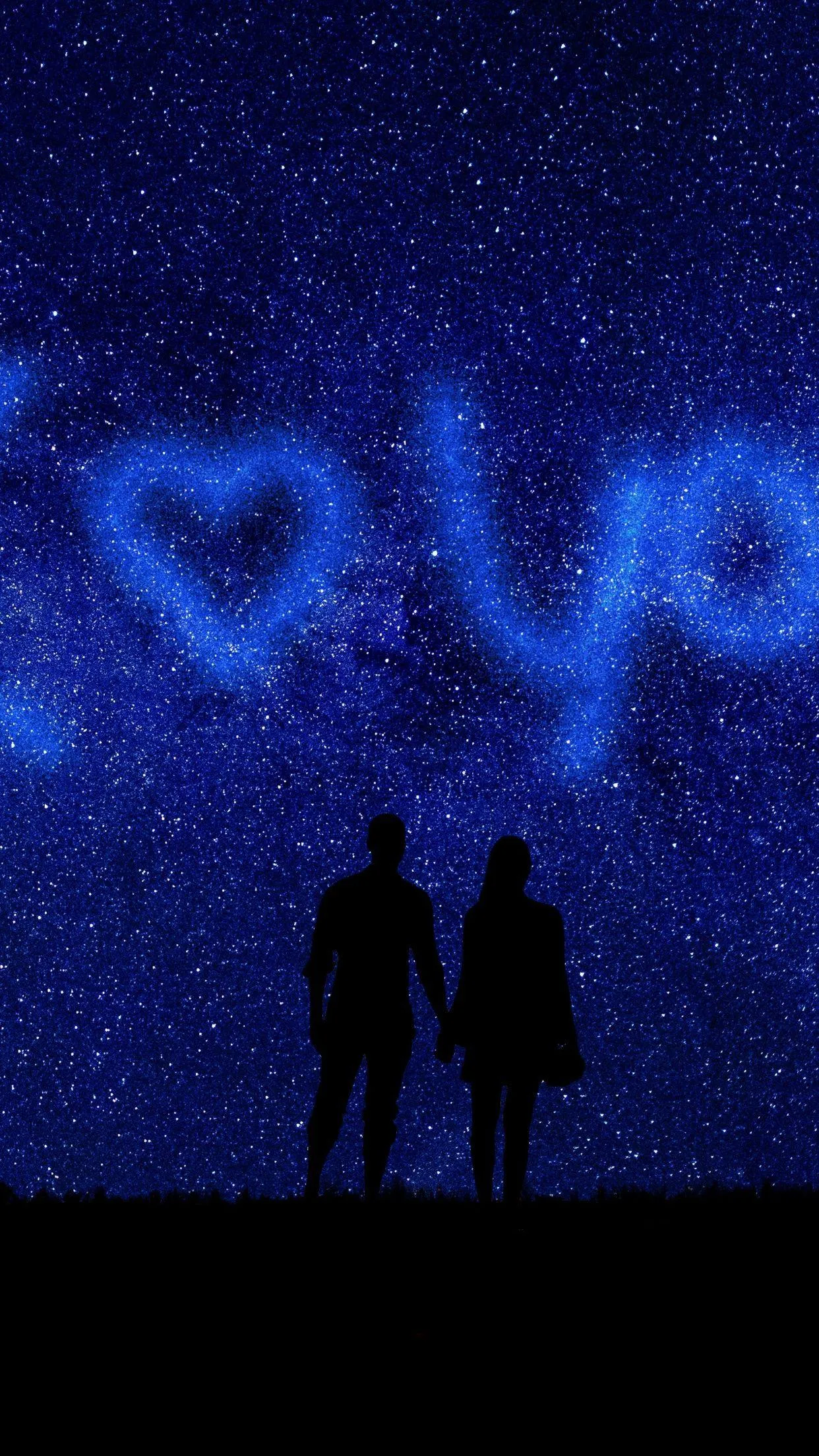 Portrait of Couple Under Stars Writing Love in the Sky