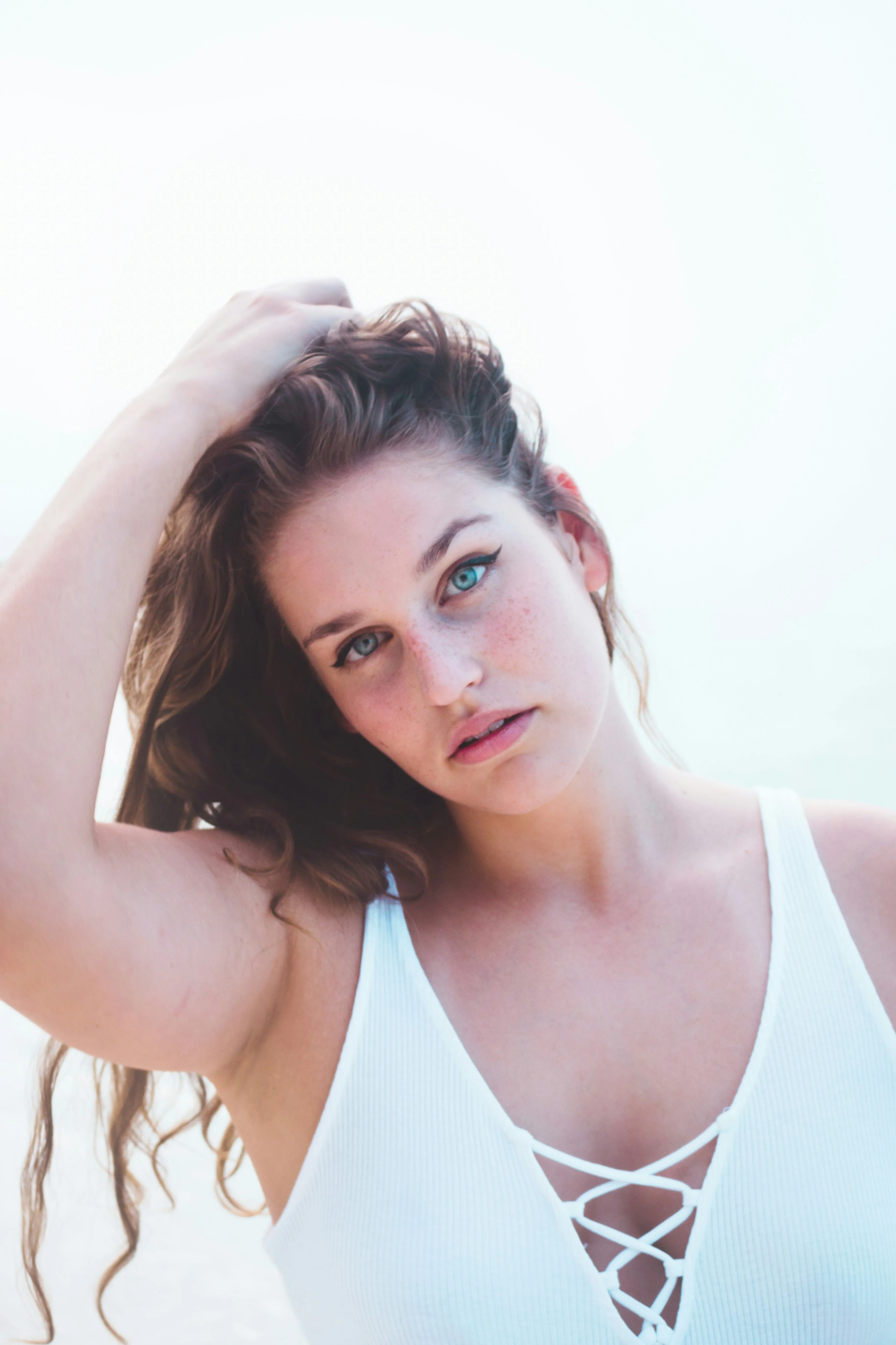 Portrait of Woman in White with Natural Light Wallpaper