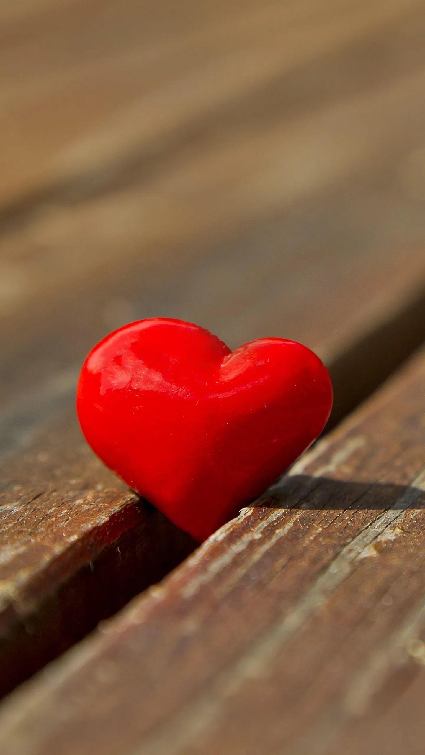 Red Heart on Wooden Surface of Warm Affection HD Image