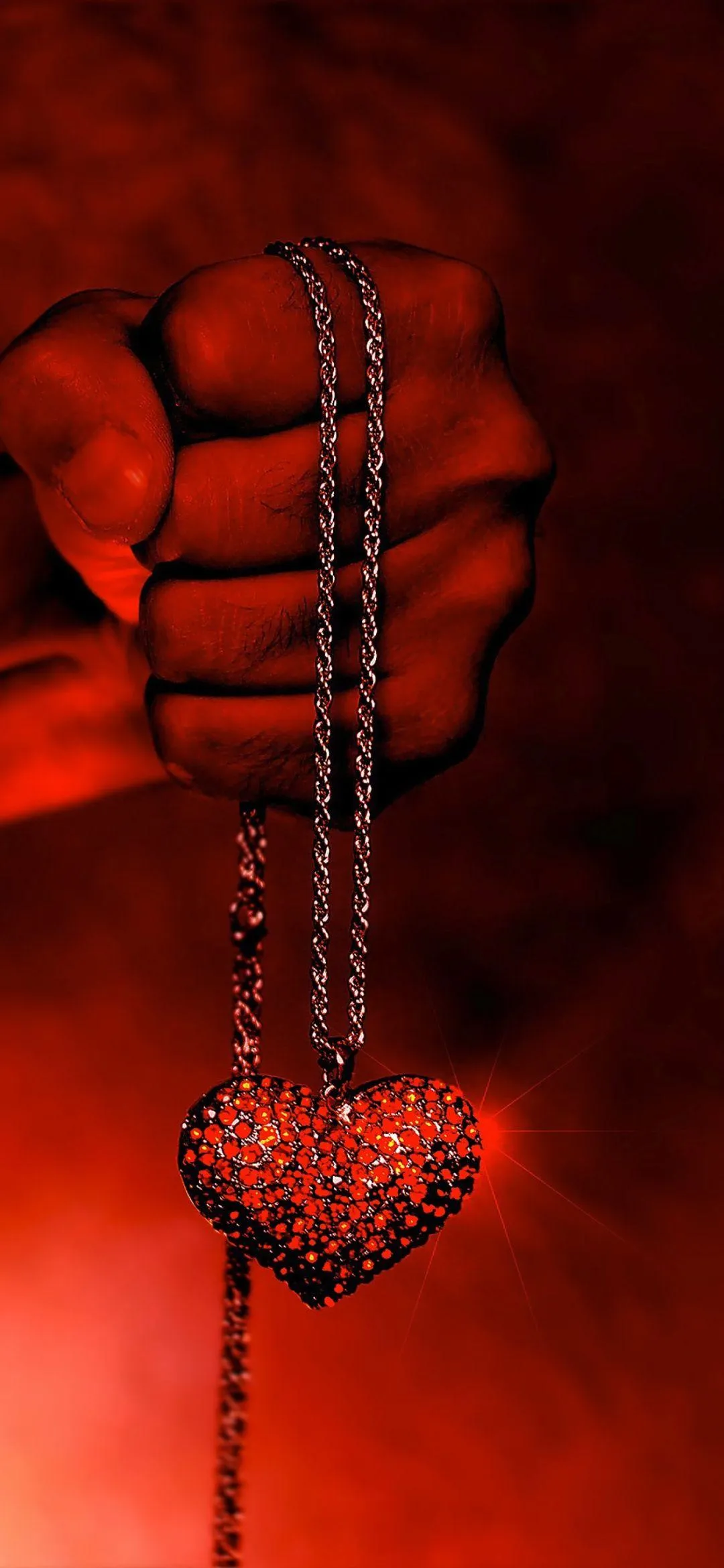 Red Heart Pendant Hanging as Sign of True Affection