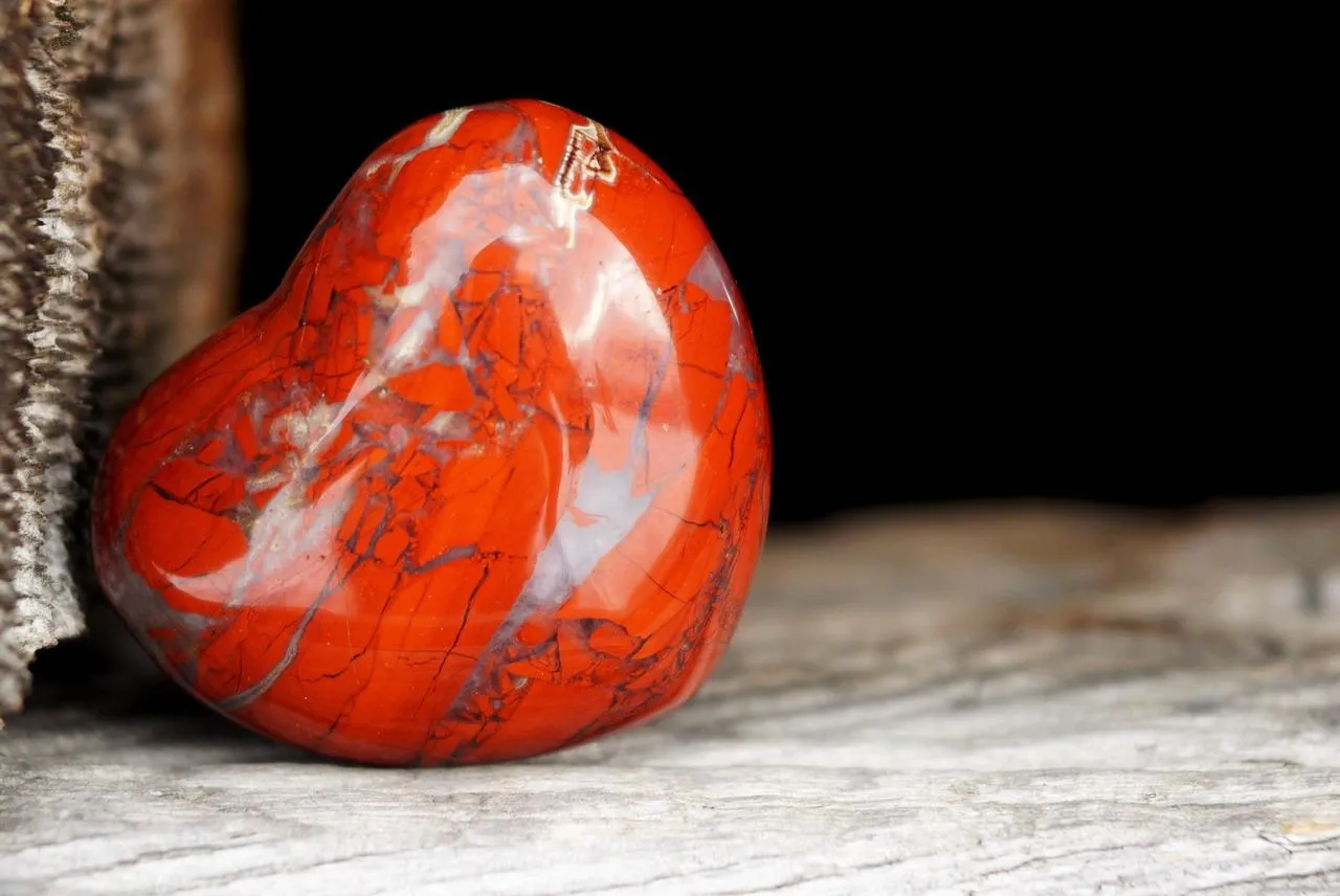 Red Heart Stone Symbolizing Strength and Love HD Image