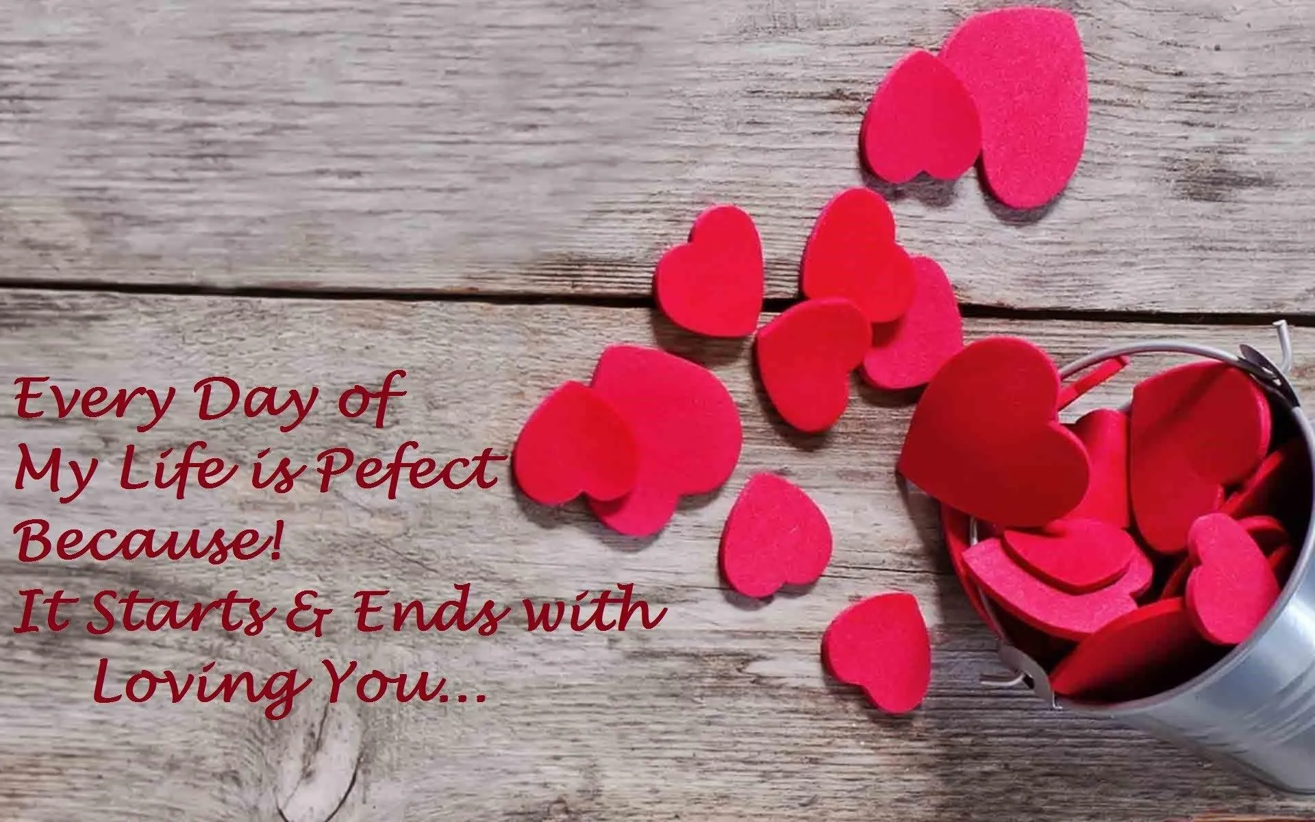 Red Hearts on Grey Board with Romantic Quote Wallpaper