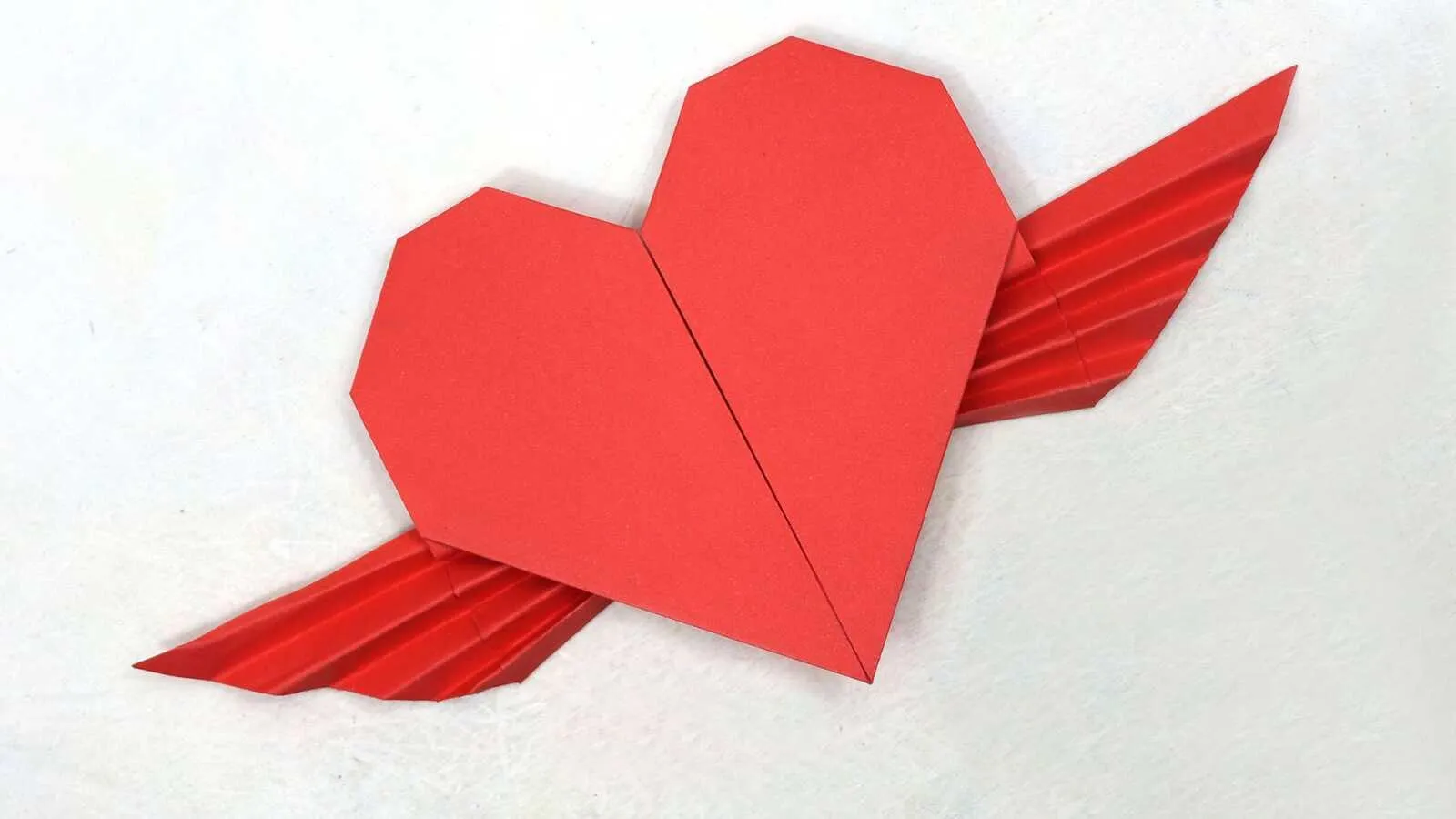 Red Paper Heart with Wings Creative Love Concept Wallpaper