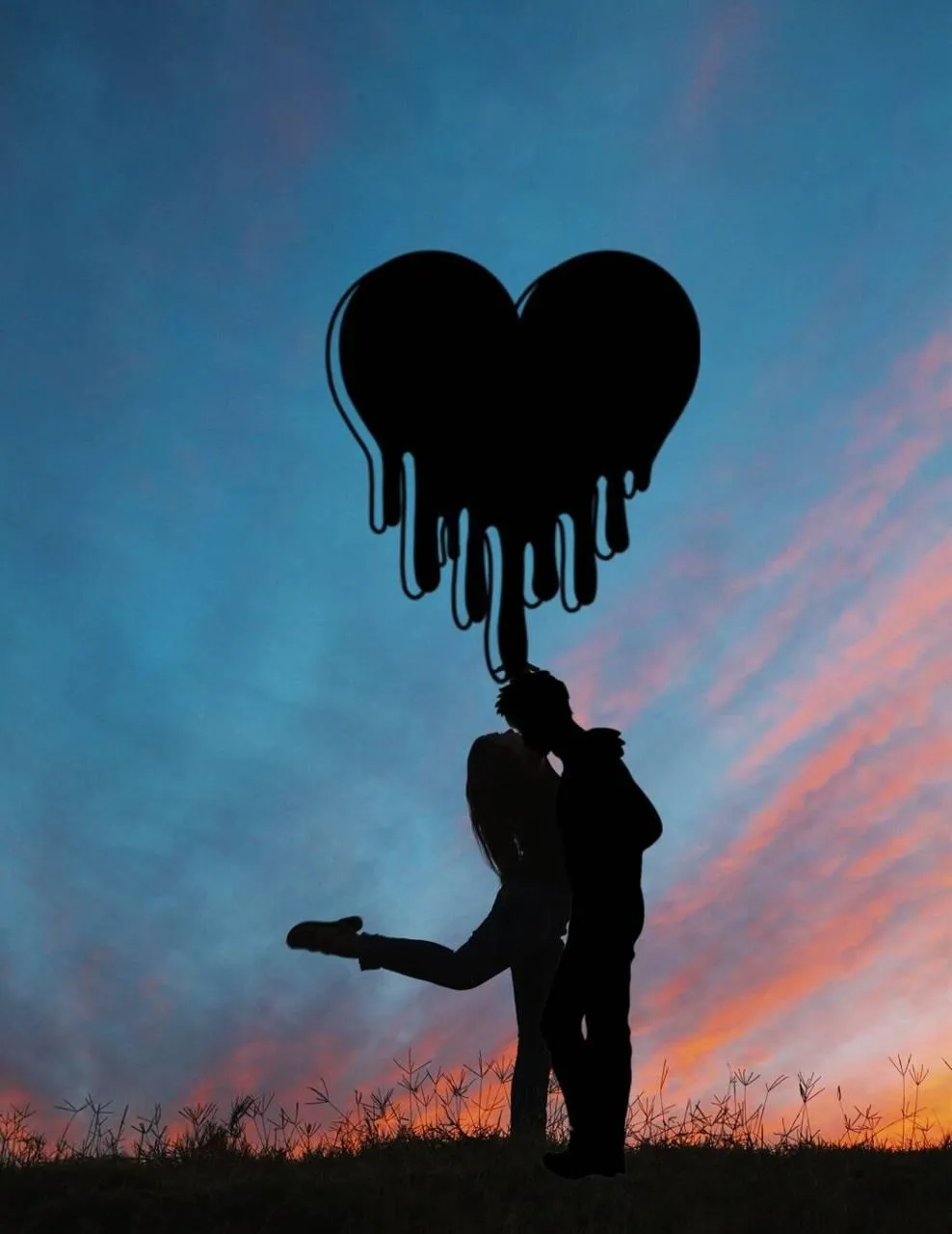 Romantic Couple Silhouette Under Dripping Heart at Sunset