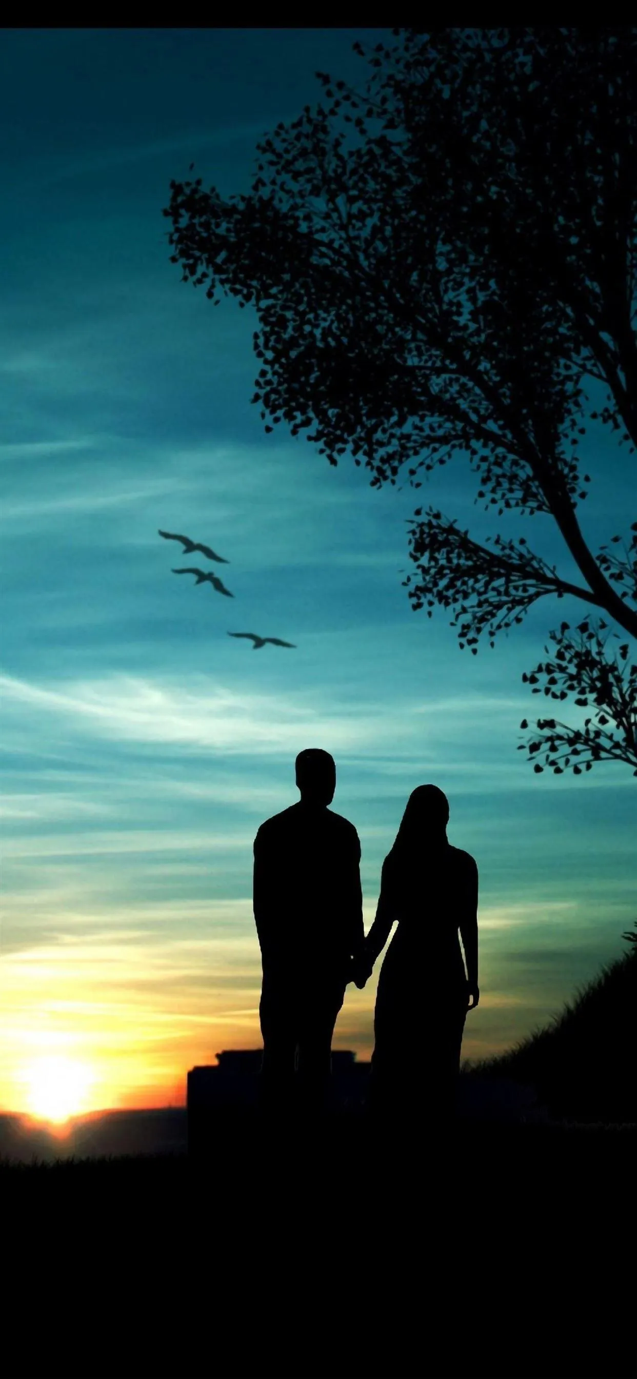 Romantic Evening Silhouette Couple in Sunset Glow Wallpaper