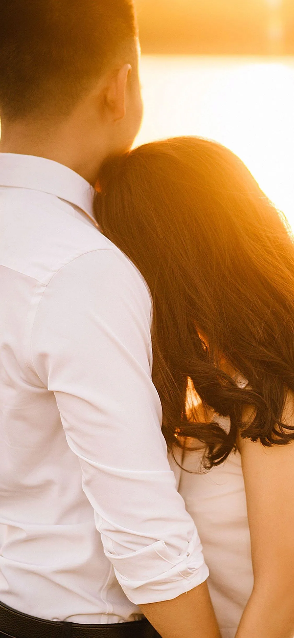 Romantic Hug Showing Deep Trust And Connection Wallpaper