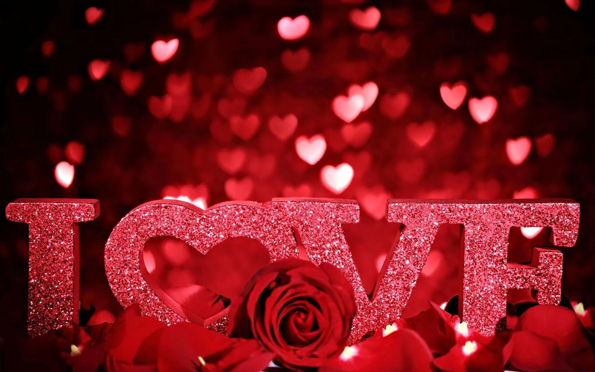 Romantic Red Love Text with Shining Hearts Wallpaper