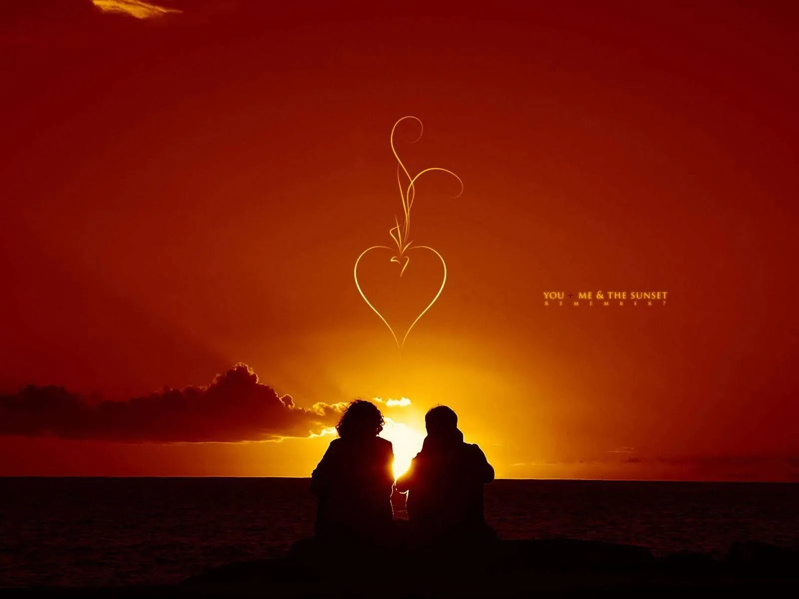 Romantic Sunset Couple Sitting Beside the Sea Wallpaper
