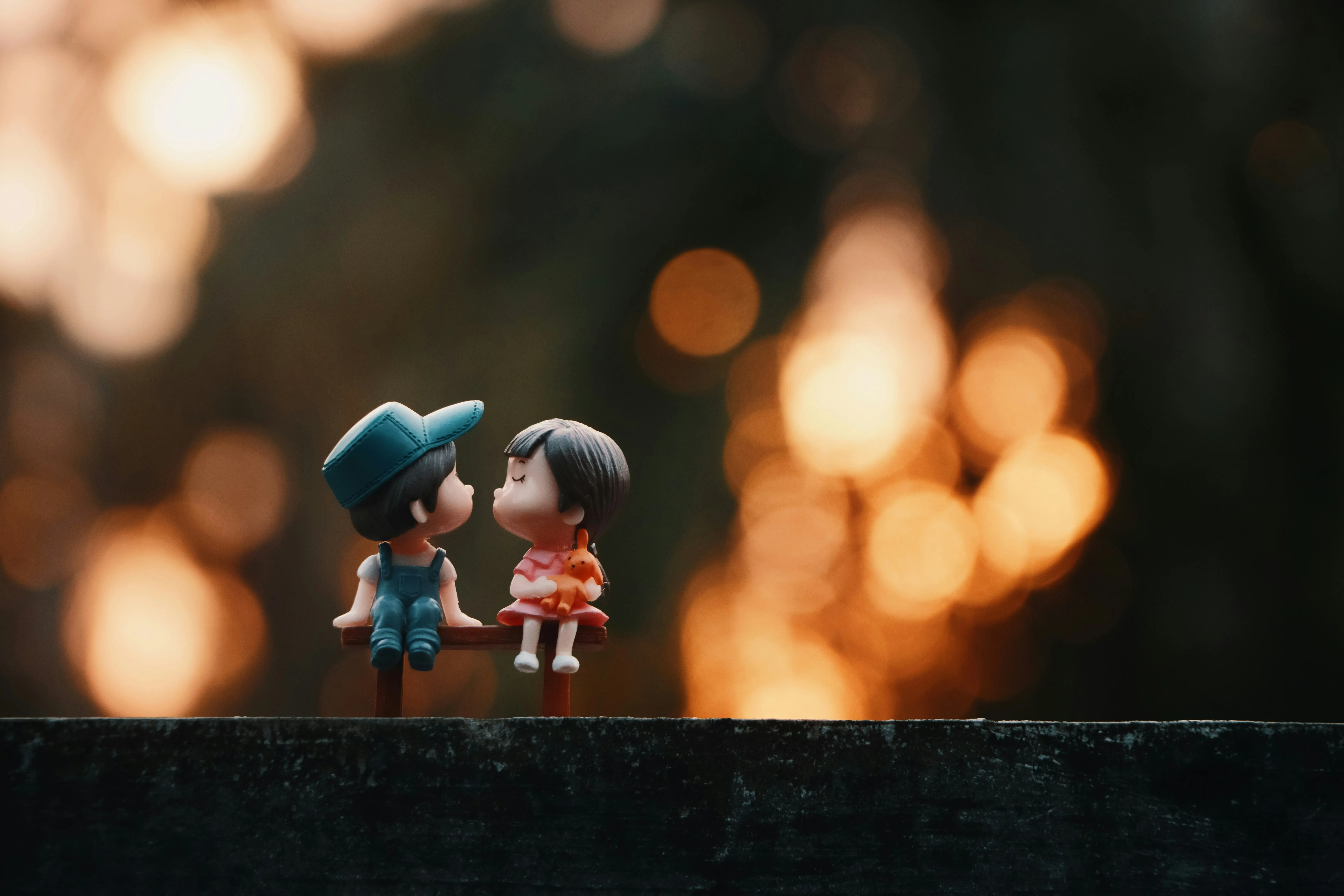 Romantic Toy Couple Captures Essence of Young Love Wallpaper