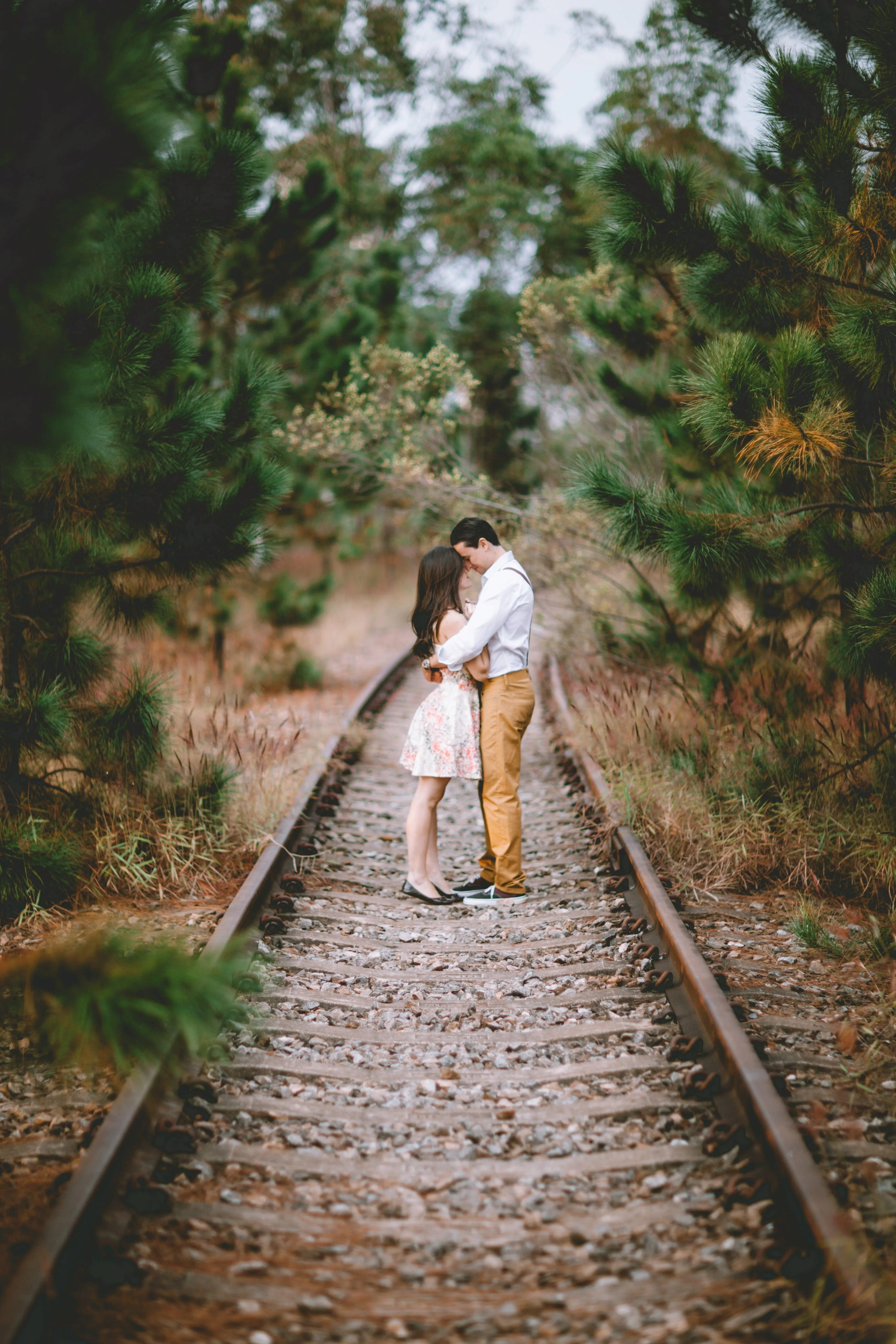 Romantic Walk on Railway Path Together Forever Wallpaper