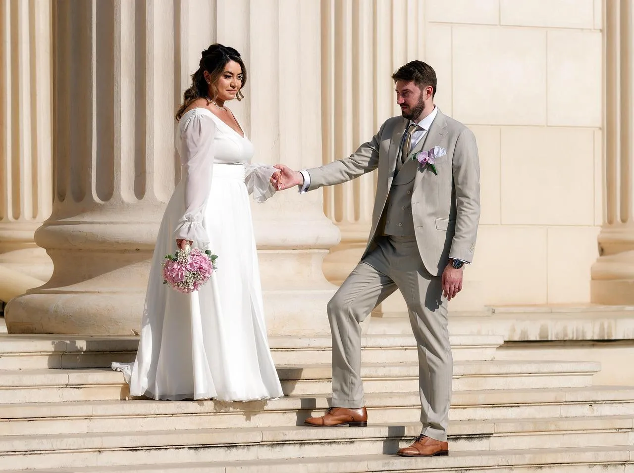 Romantic Wedding Couple Walking Hand in Hand Wallpaper