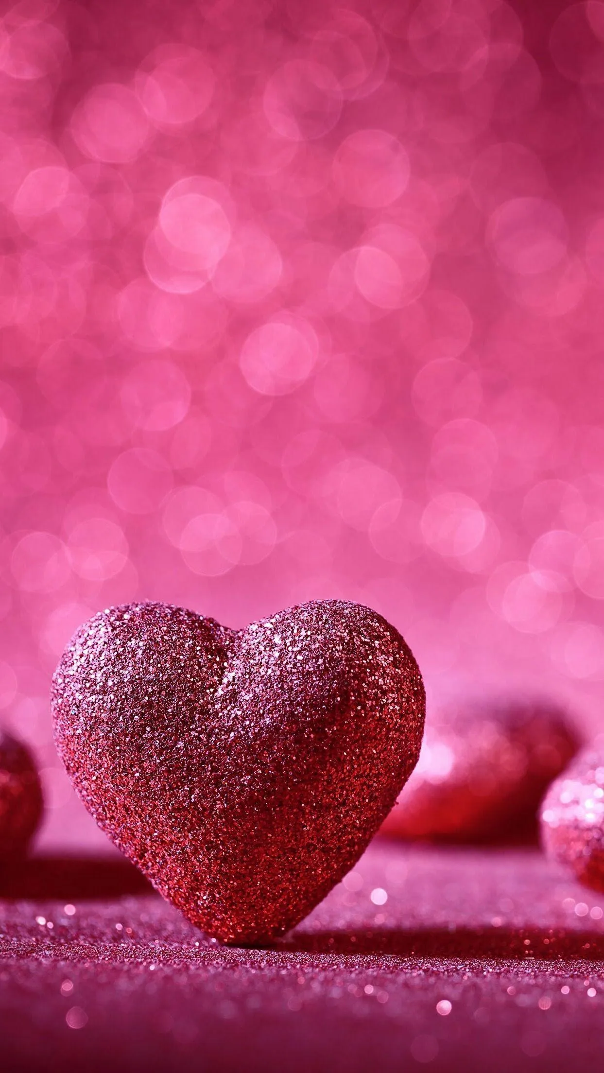 Shining Red Heart on Pink Surface of True Affection