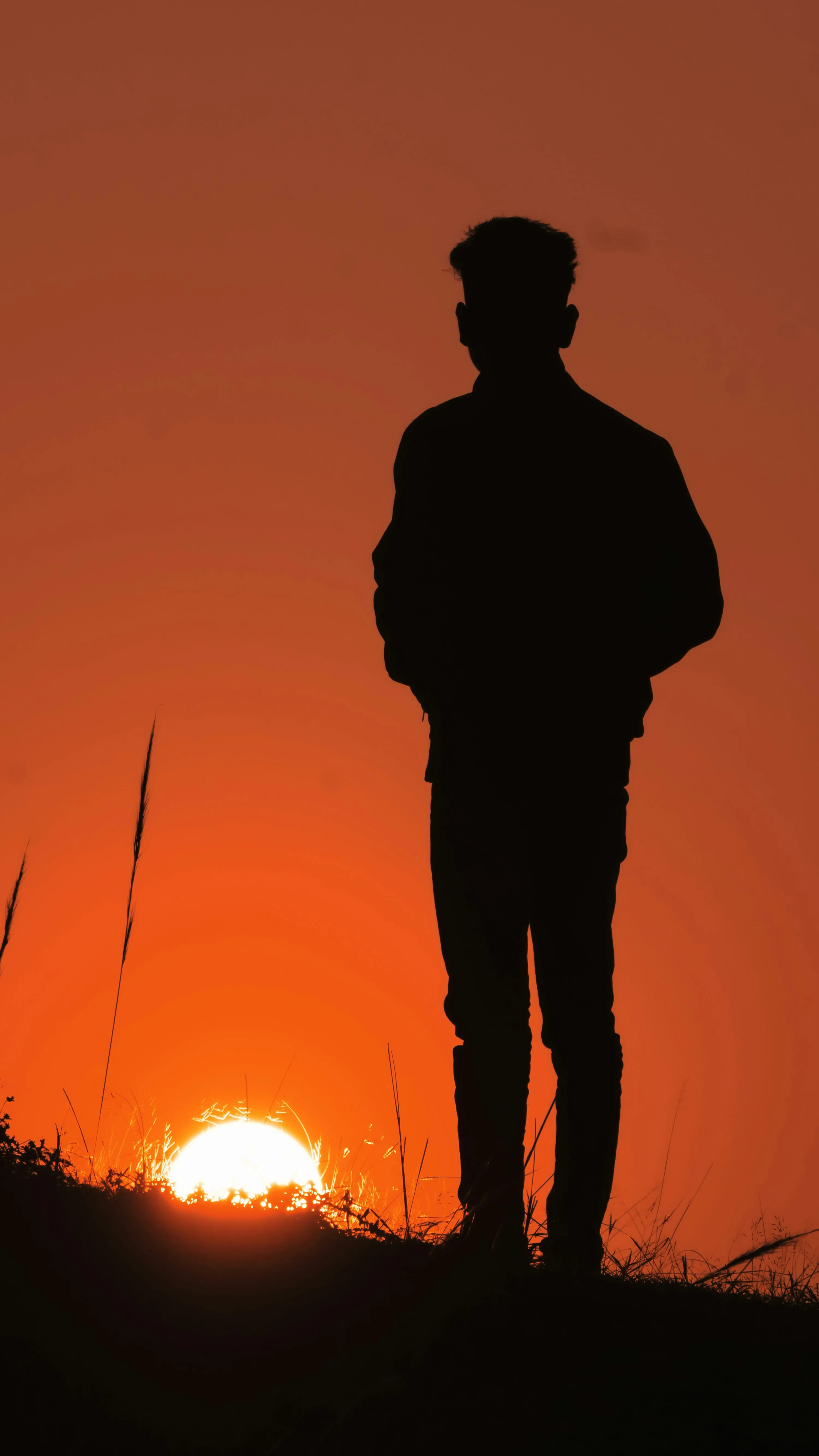 Silhouette at Sunset Capturing Peaceful Emotion Wallpaper