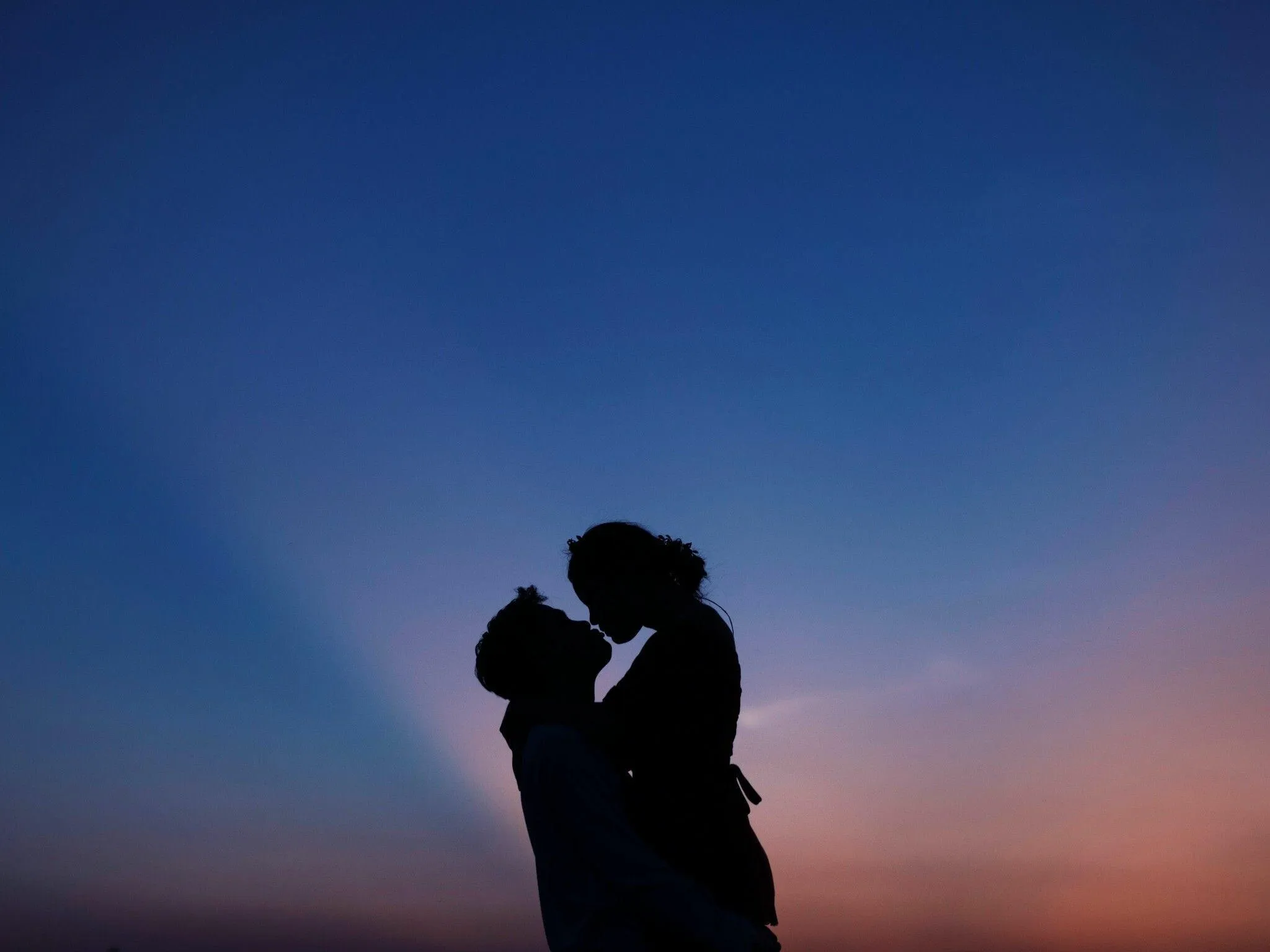 Silhouette Kiss Under Moonlight Symbol of True Love