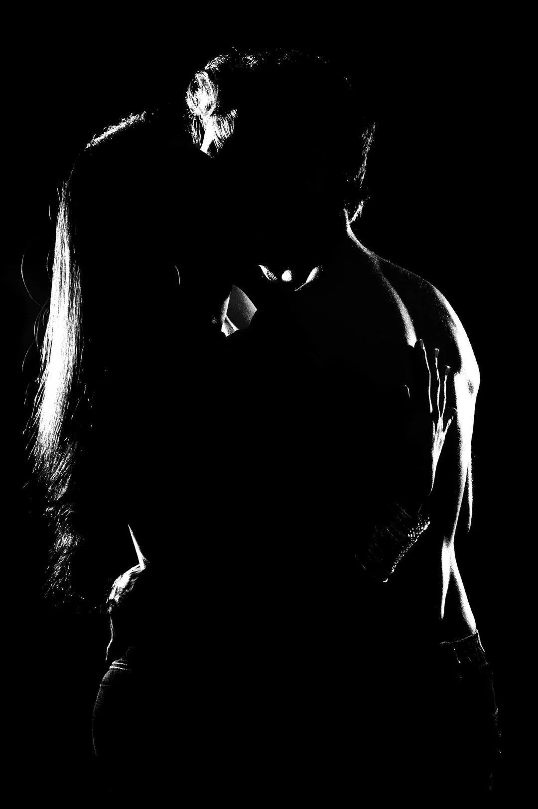 Silhouette of Couples Reflecting on Deep Affection Image