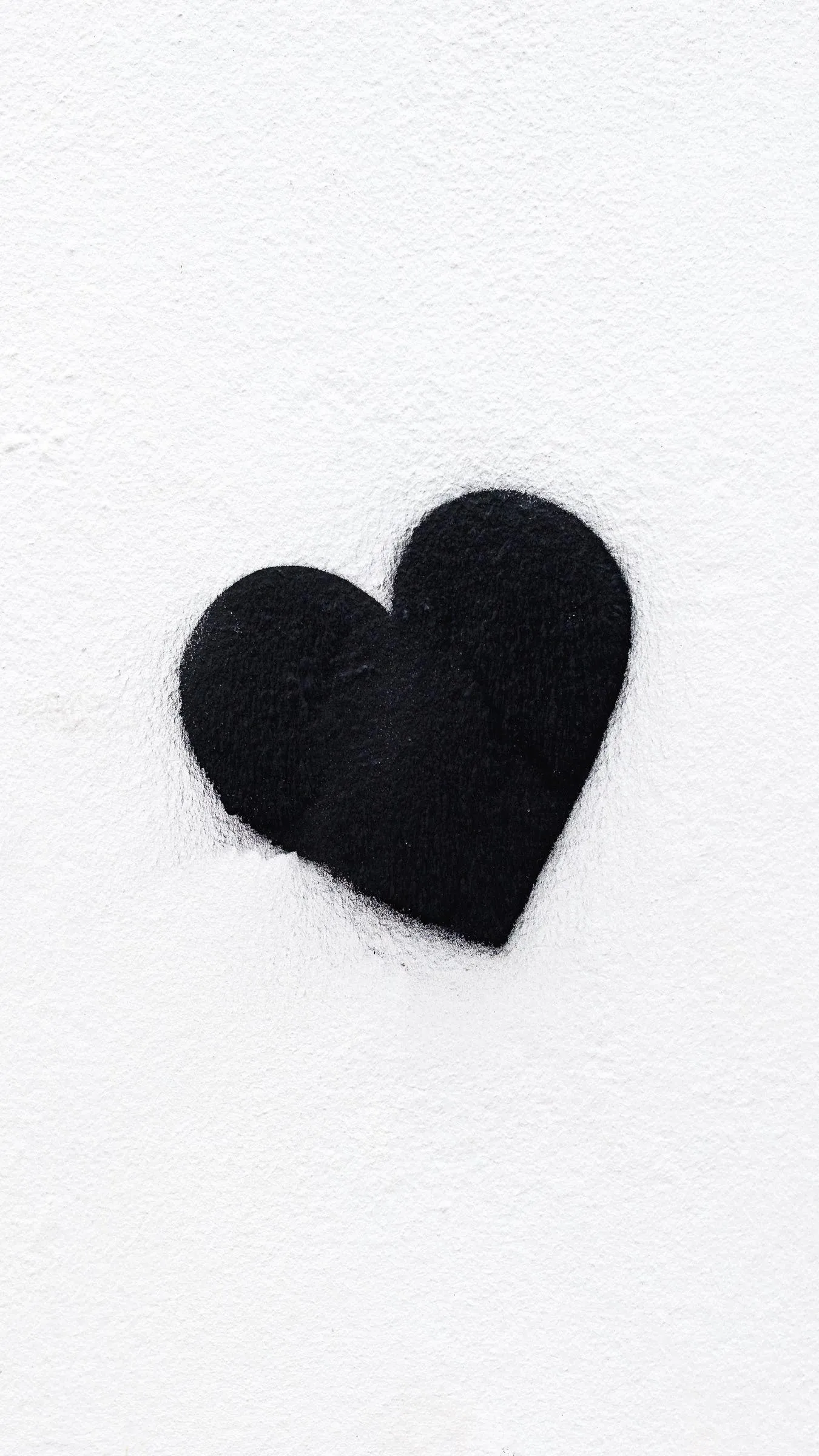 Simple Black Heart on White Showing Minimalist Love Image