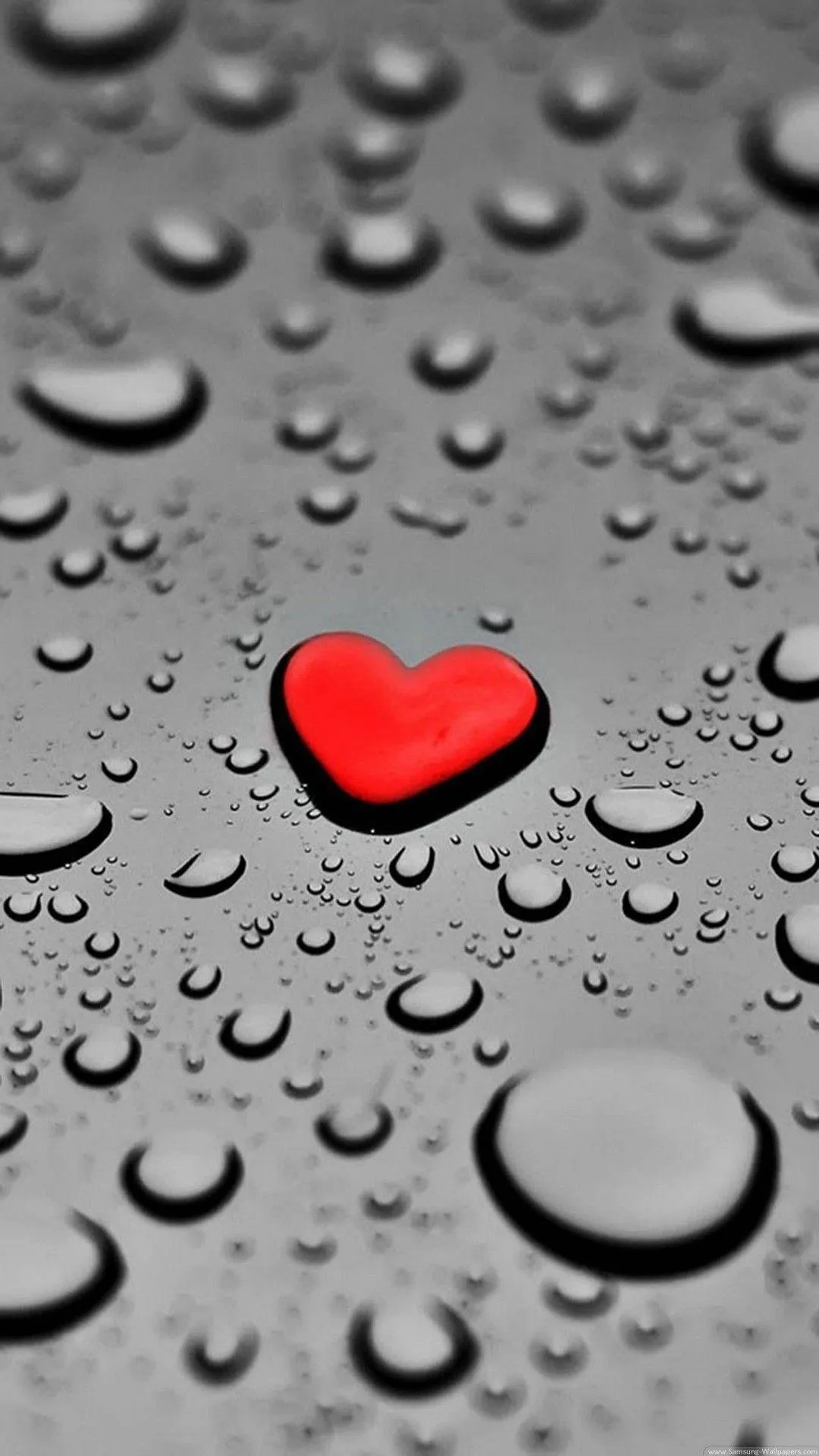 Single Red Heart on Raindrops Background of Emotion