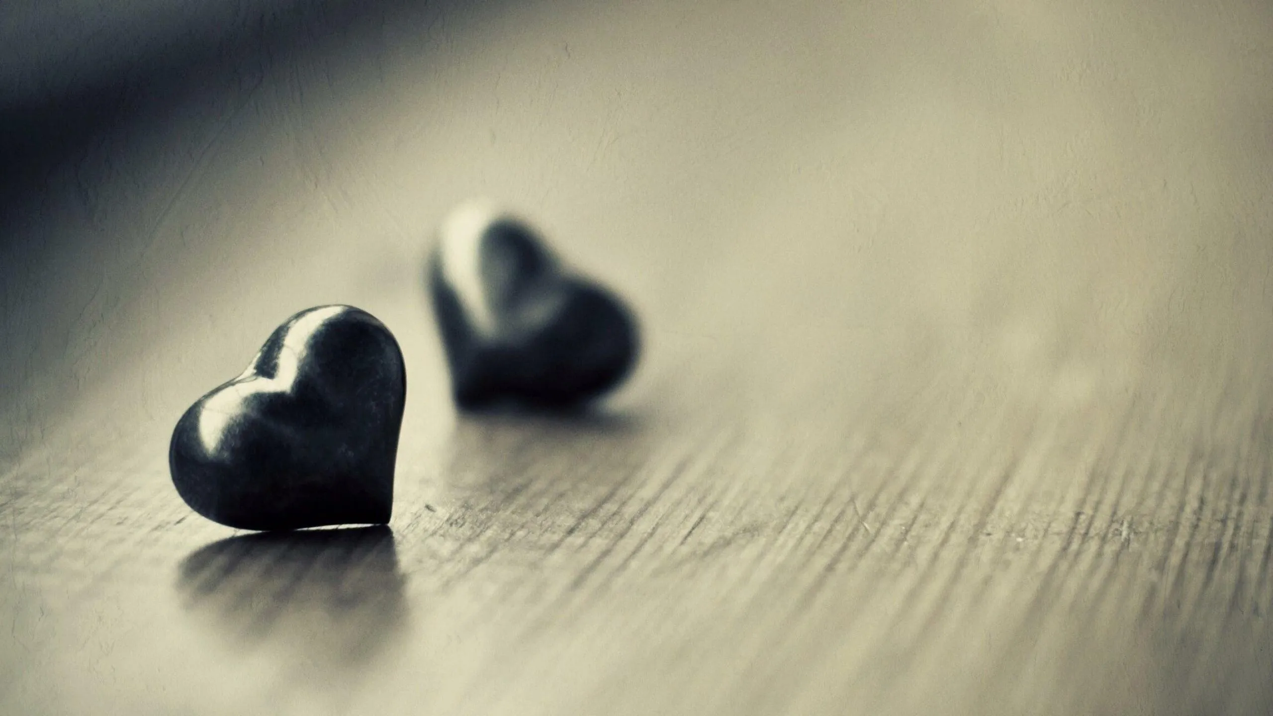 Two Black Hearts Symbolizing Deep Emotional Bond Wallpaper