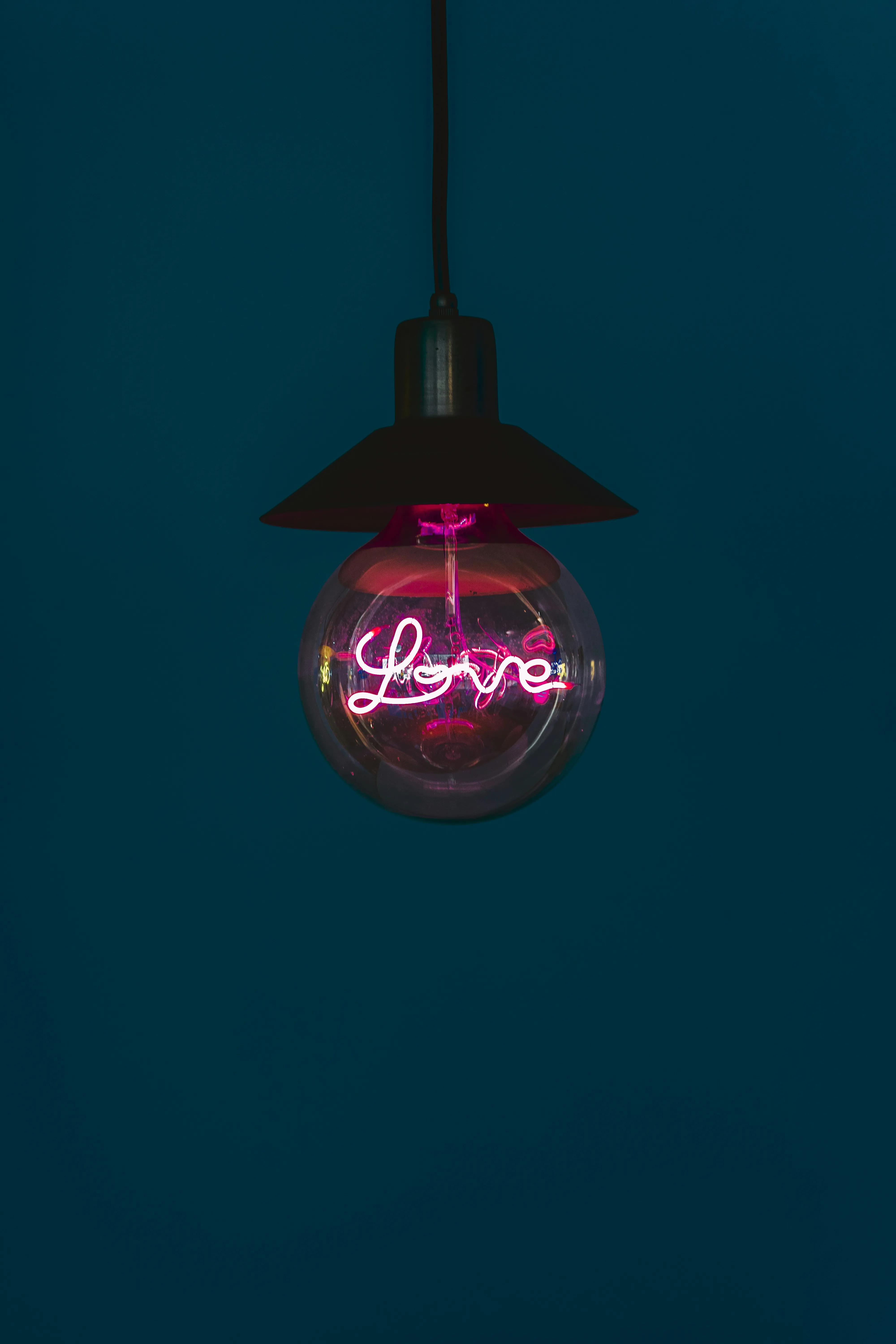 Vintage Red Lamp Glowing in Dark Quiet Room Wallpaper