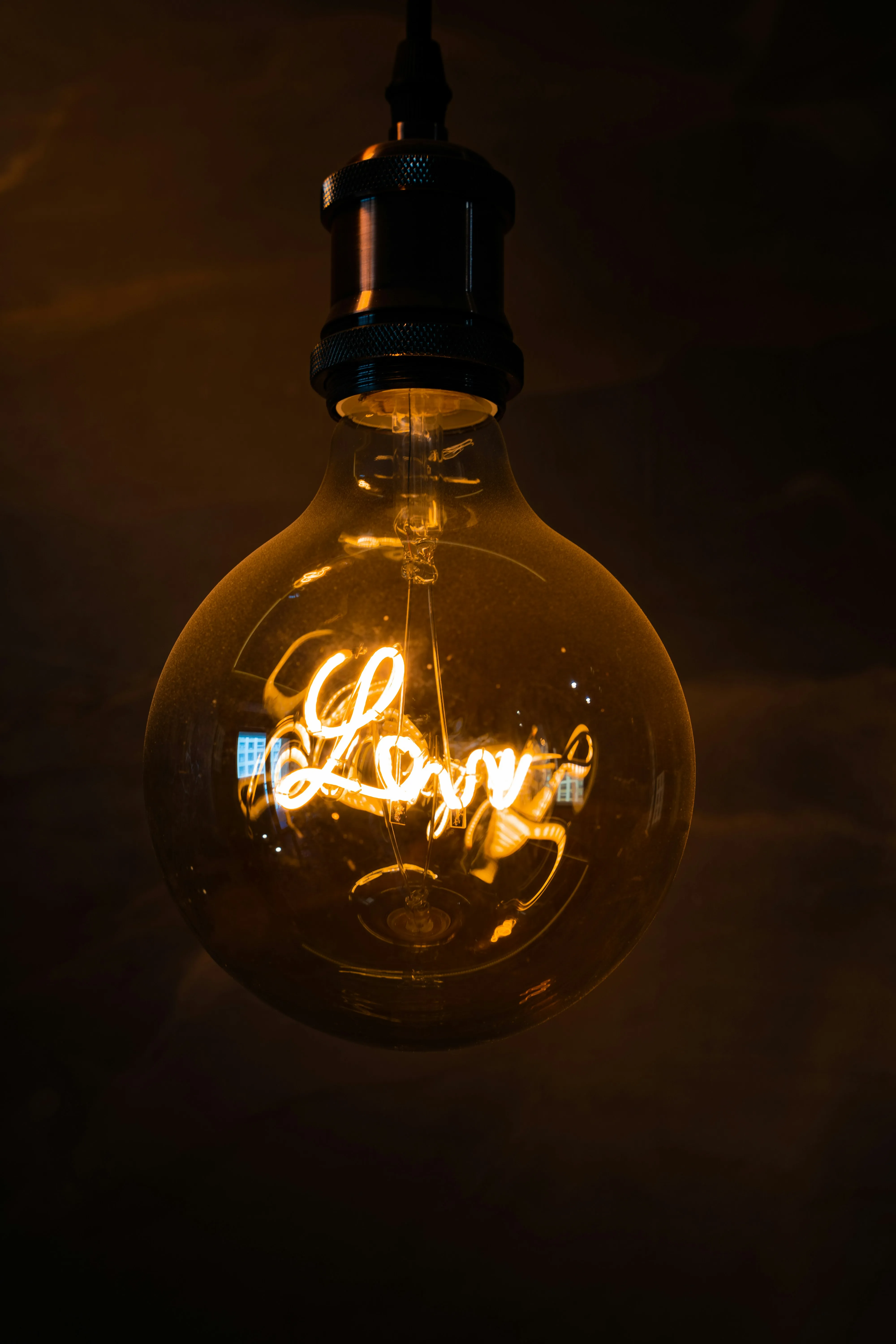 Warm Light Bulb Representing Inspiration in Love Wallpaper