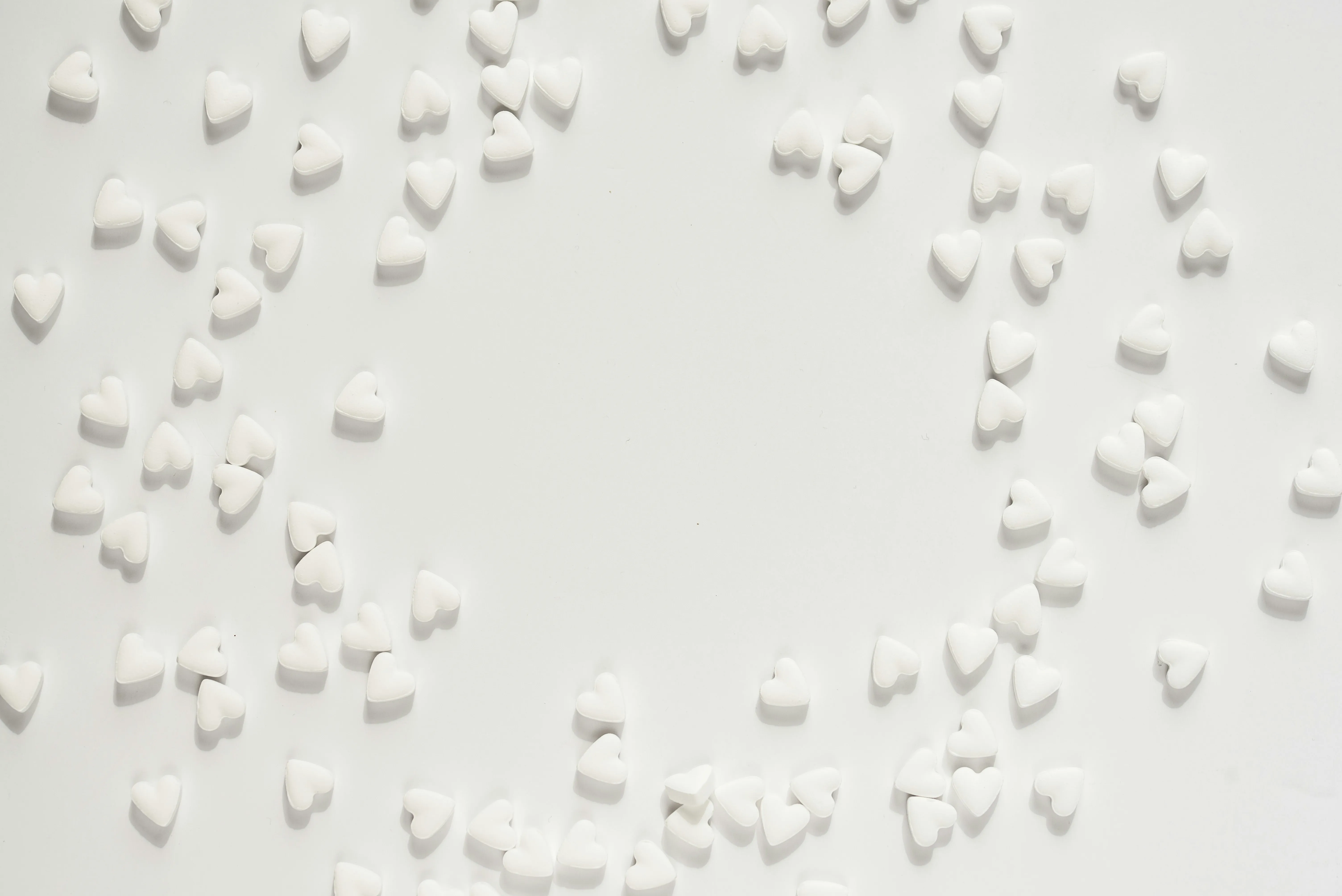 White Background with Small 3D Heart Pattern Wallpaper