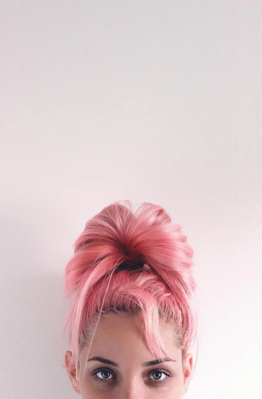 Woman with Pink Hair Expressing Creative Love Theme