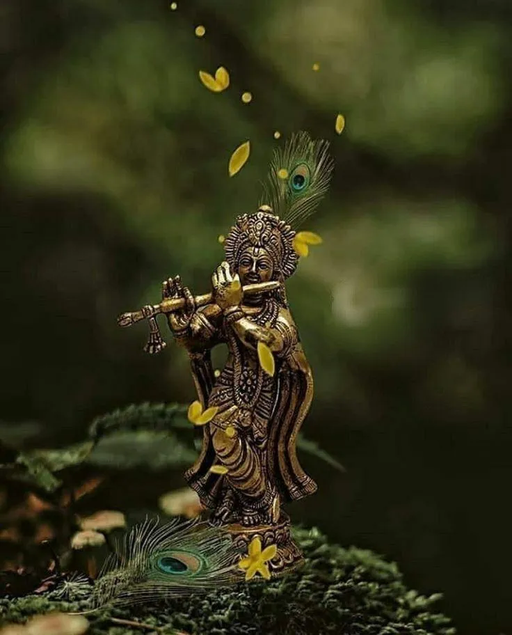 Divine Krishna Flute Brass Idol with Peacock Feather Wallpaper