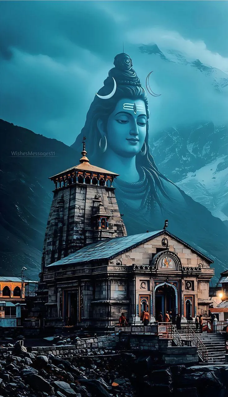 Sacred Kedarnath Temple with Majestic Shiva Statue Wallpaper