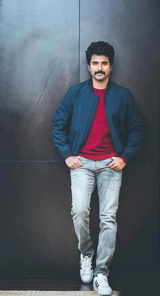 Actor Sivakarthikeyan in Red with Blue Outfit Wallpaper