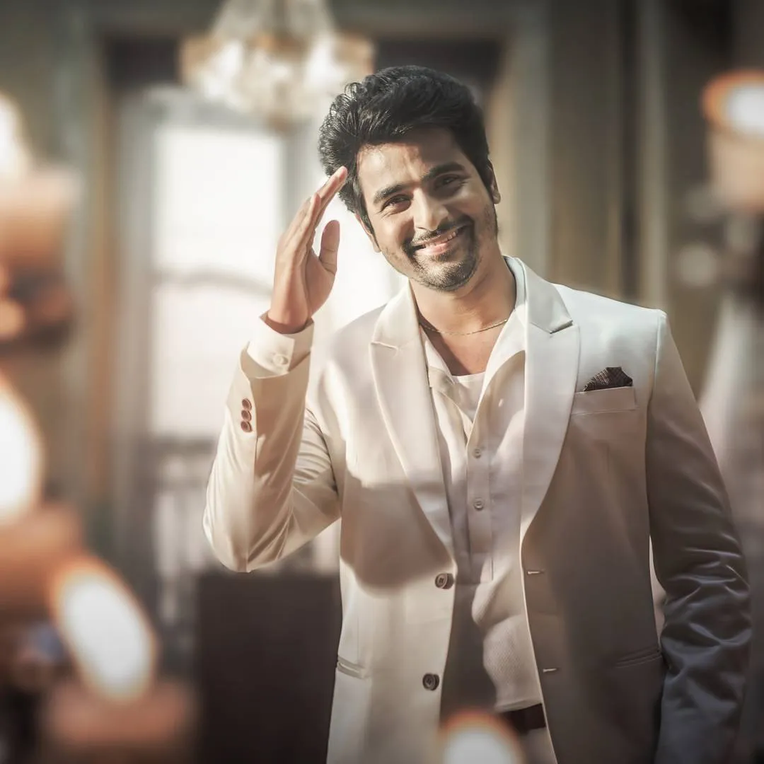 Actor Sivarthikeyan in a Cream Blazer and a Smile Wallpaper