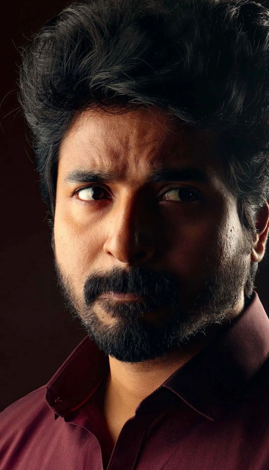 Amazing Wallpaper of Sivakarthikeyan in Maroon Shirt HD