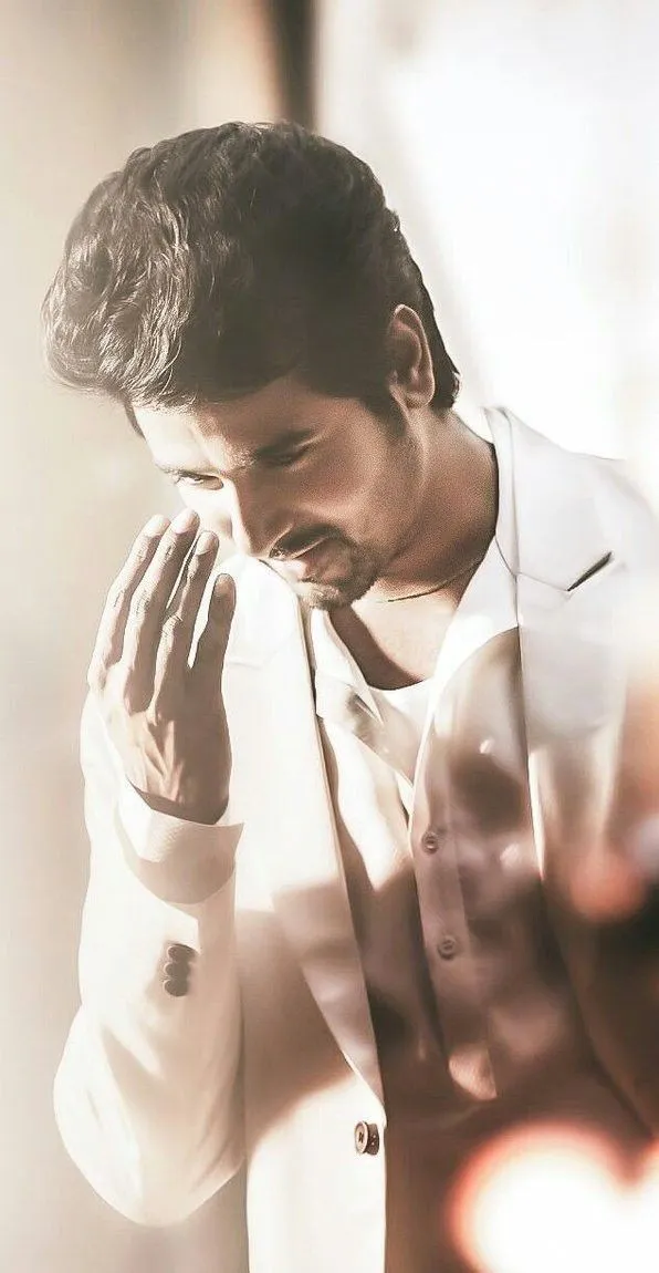 Artistic Wallpaper of Sivakarthikeyan in White Blazer Hd