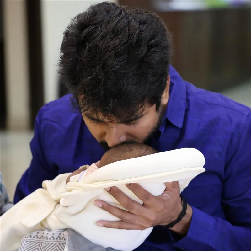 Beautiful Still of Sivakarthikeyan Kissing His Son Gugan