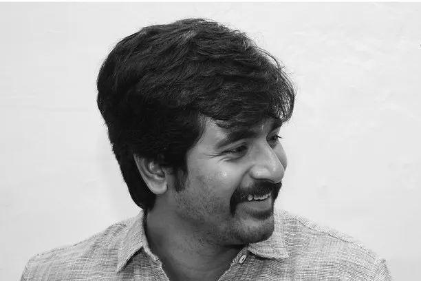 Black and White Image of Sivakarthikeyan Looking Sideways
