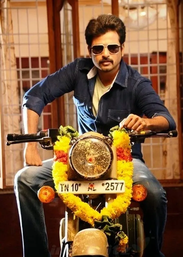 Masss Look of Sivakarthikeyan Sitting on a Bullet Wallpaper