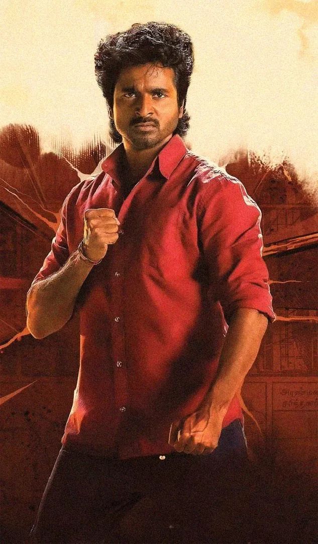 Portrait Image of Sk in Red Shirt Posing in Textured Backdrop