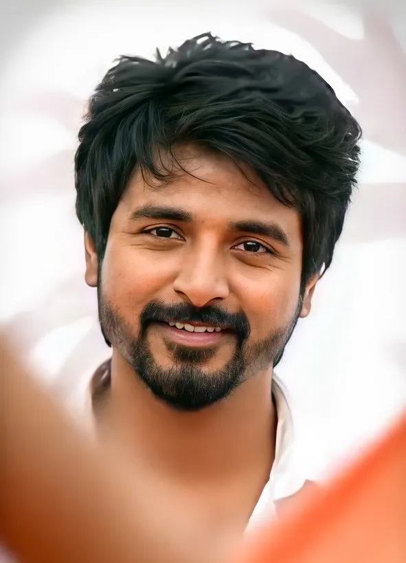 Portrait Wallpaper of Sivakarthikeyan with a Cute Smile
