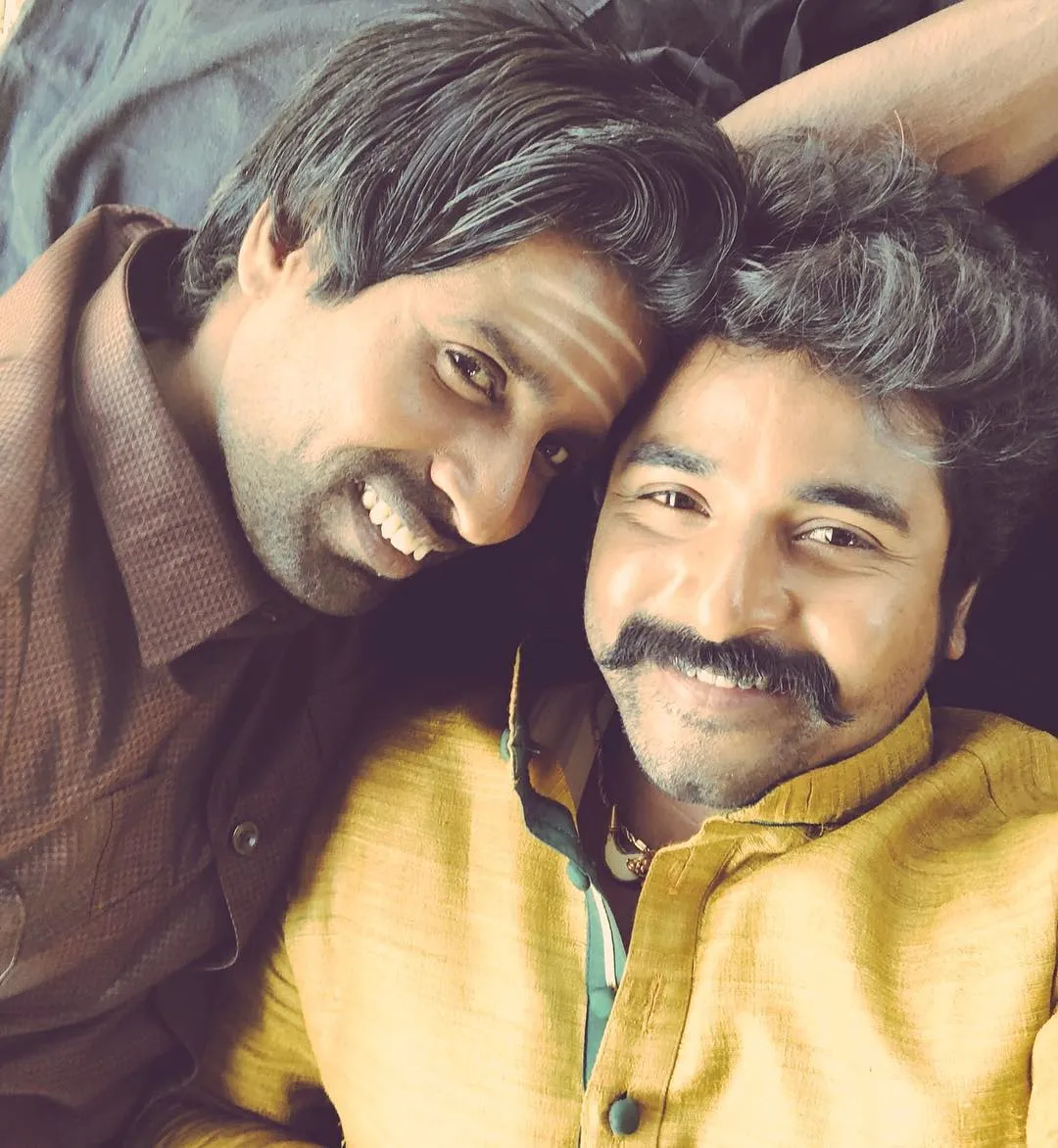 Sivakarthikeyan and Soori Lying on the Bed and Posing Image