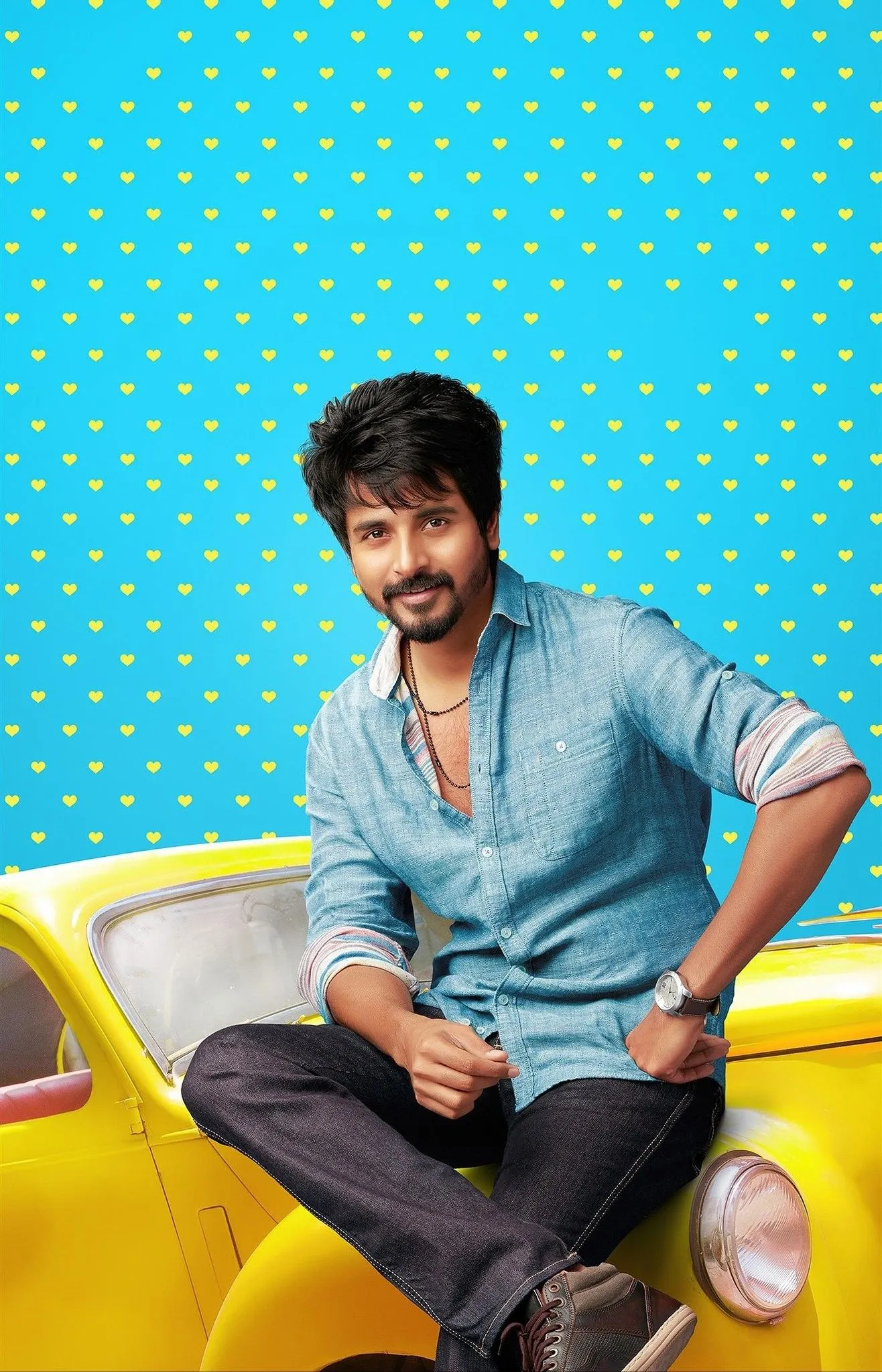 Sivakarthikeyan Casual Fun Pose on the Yellow Car